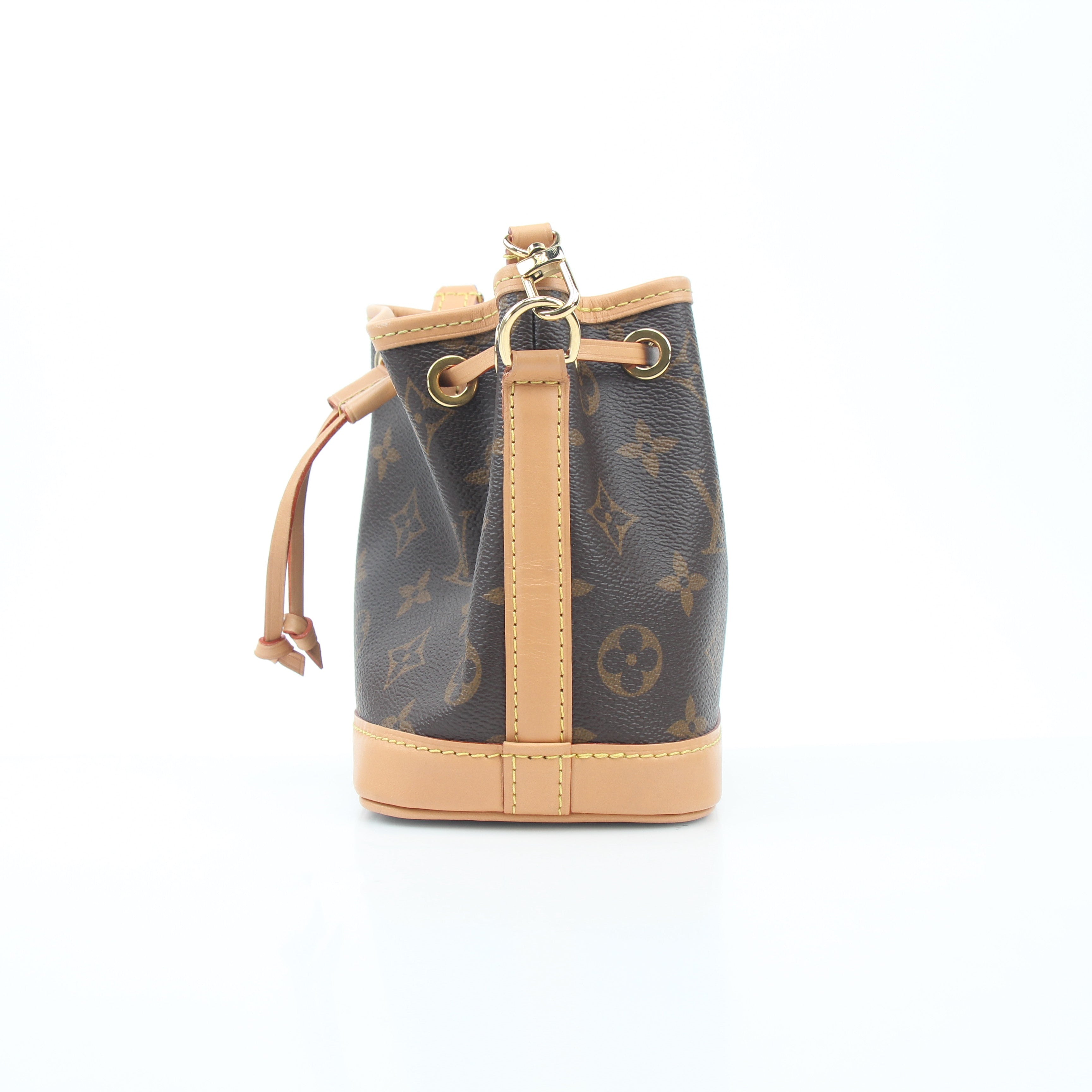 Gold & Beyond Louis Vuitton Monogram Nano Noé bucket handbag with leather strap and signature monogram canvas.