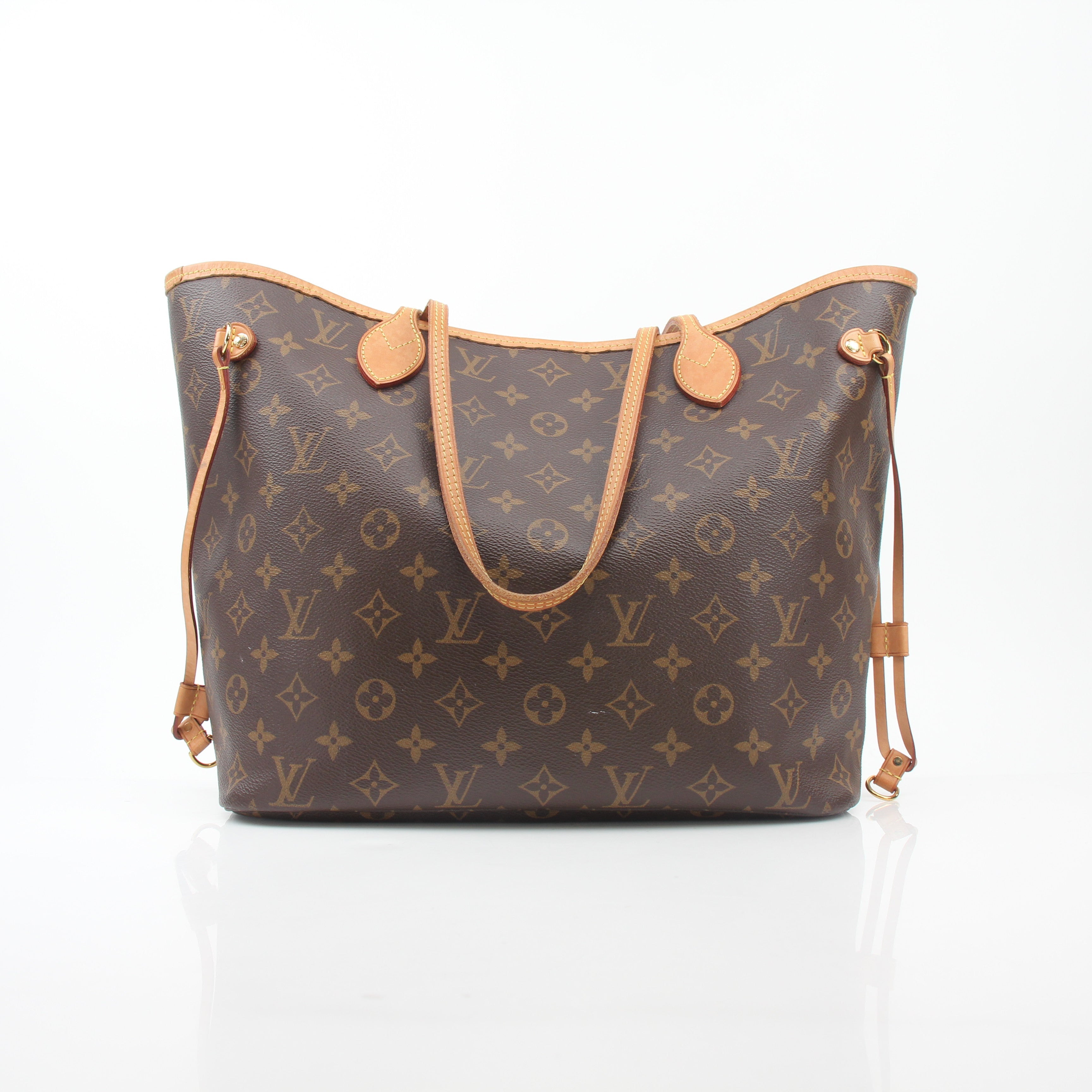 Louis Vuitton Monogram Neverfull MM tote handbag by Gold & Beyond, showing the classic monogram canvas and spacious interior.