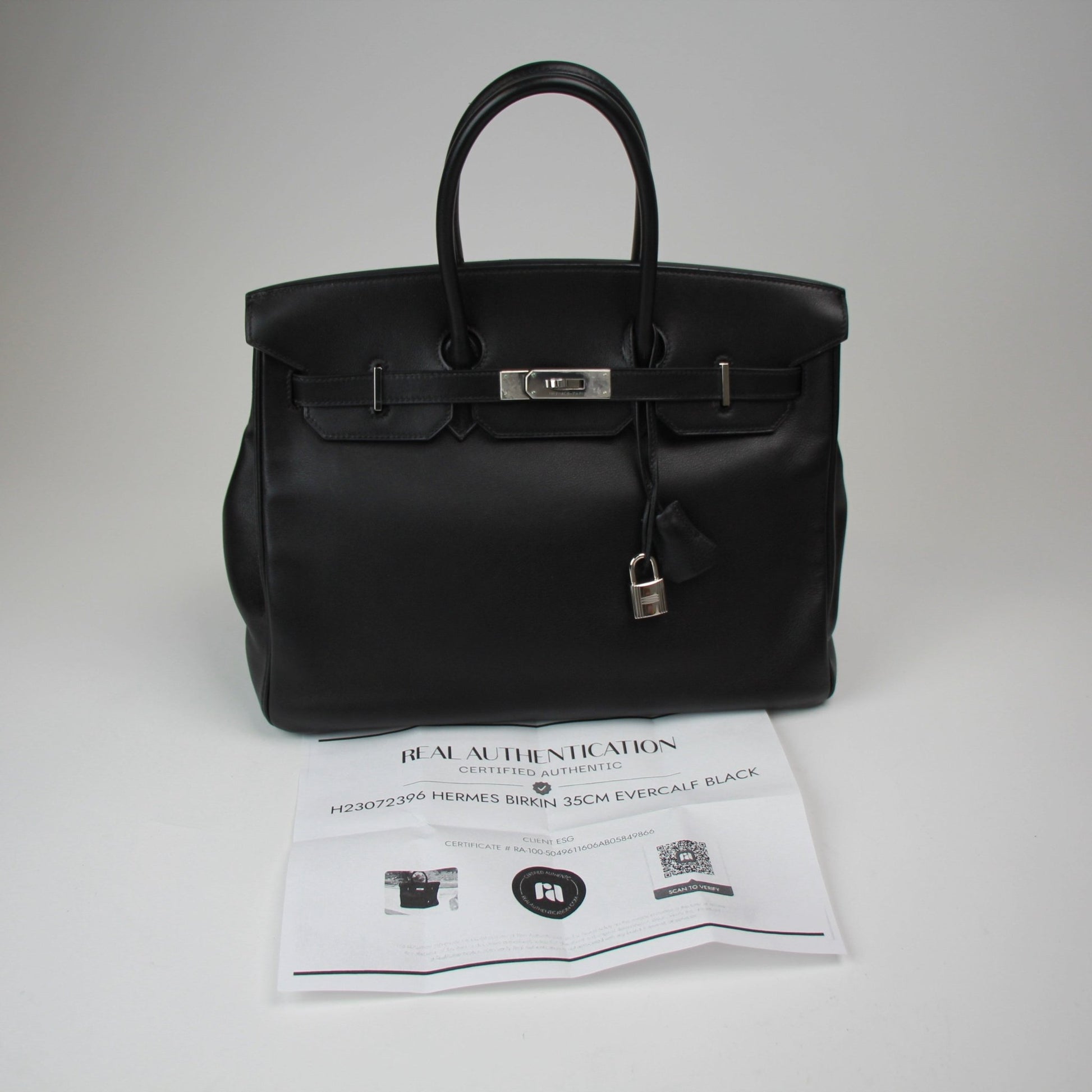 Gold & Beyond Hermès Birkin 35 handbag in classic leather with gold hardware, showcasing elegant design and craftsmanship.