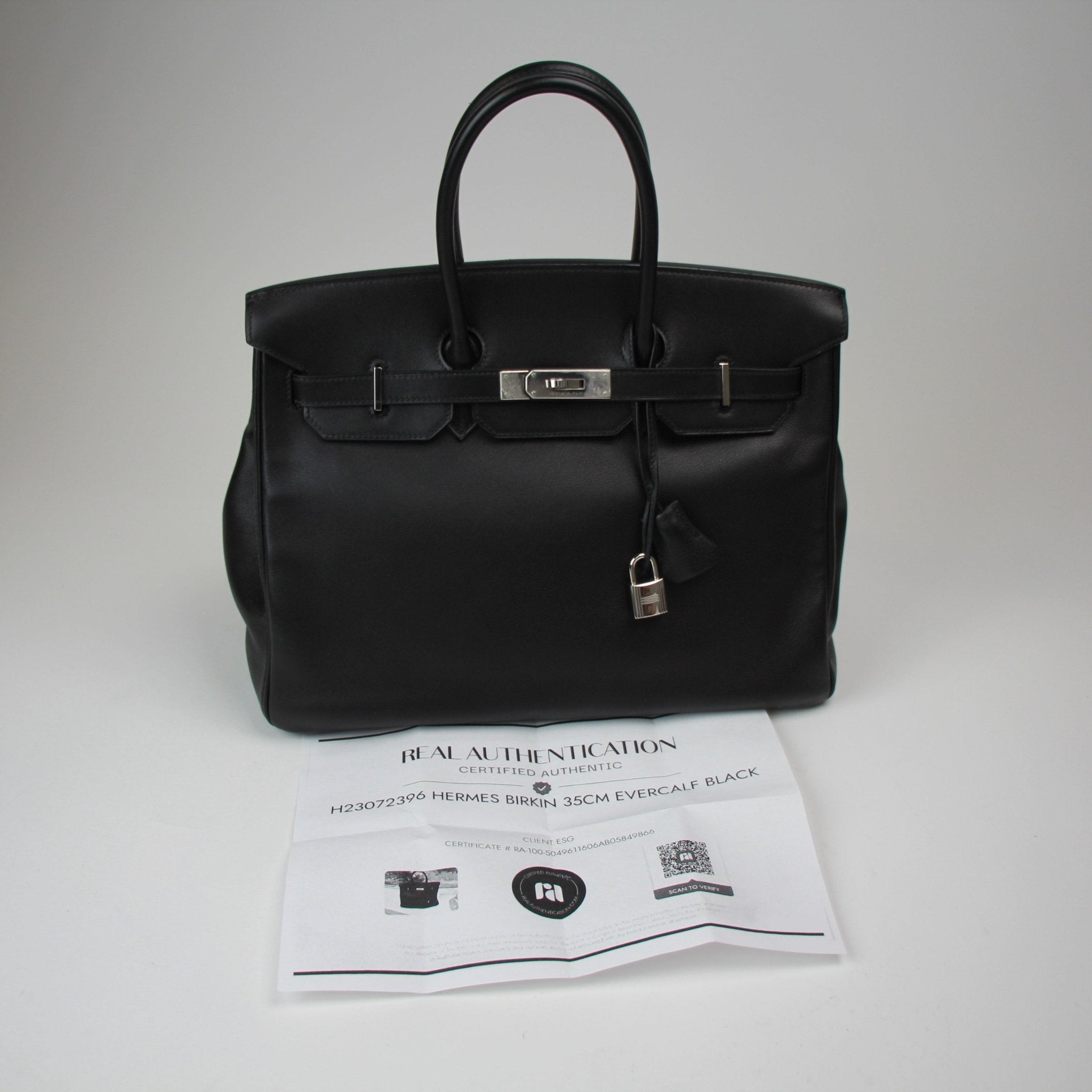 Gold & Beyond Hermès Birkin 35 handbag in classic leather with gold hardware, showcasing elegant design and craftsmanship.