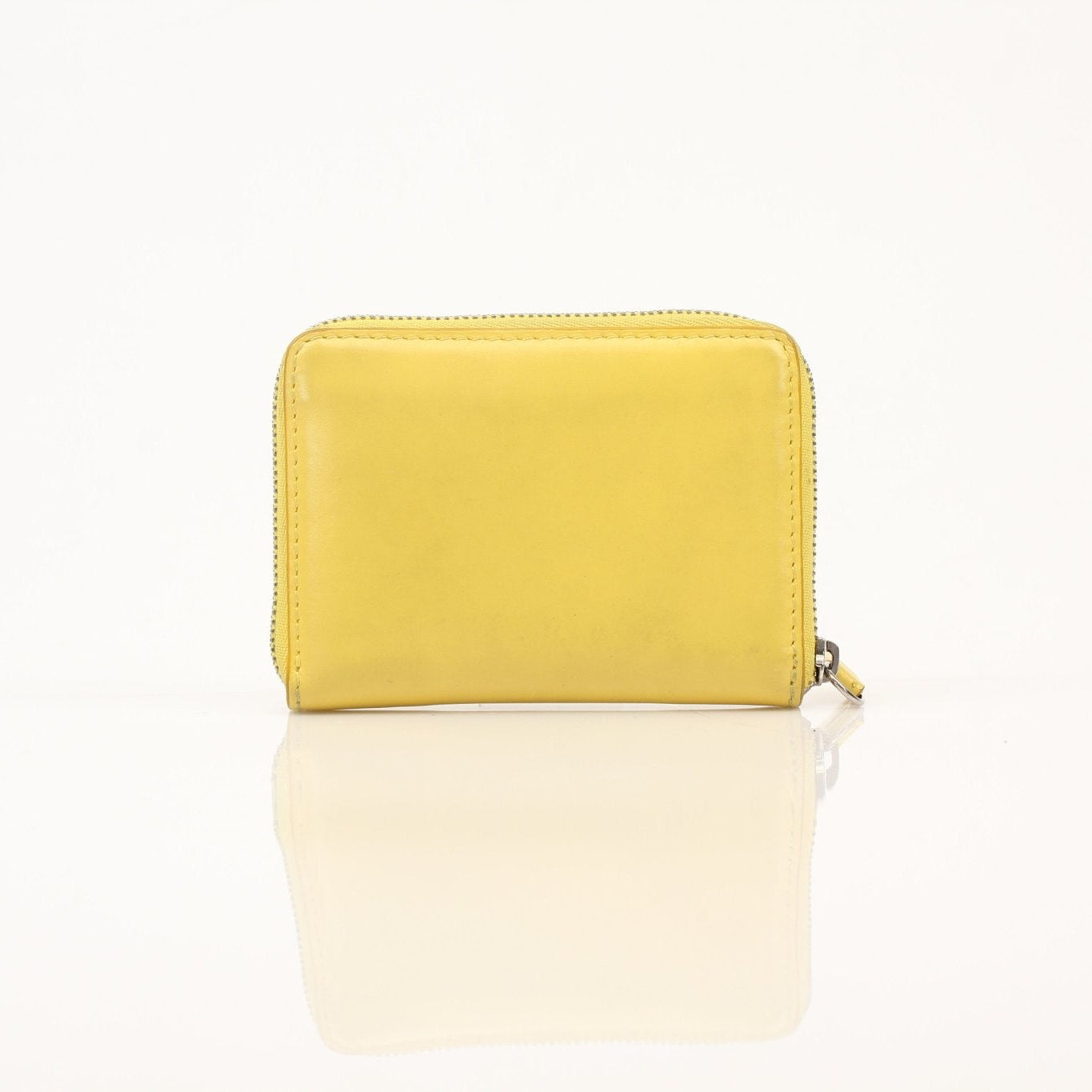 Gold & Beyond Celine Compact Zipped Wallet with gold-tone zipper, sleek design, and compact size for easy carrying.