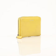 Gold & Beyond Celine Compact Zipped Wallet showing black leather exterior with silver zipper and multiple card slots.