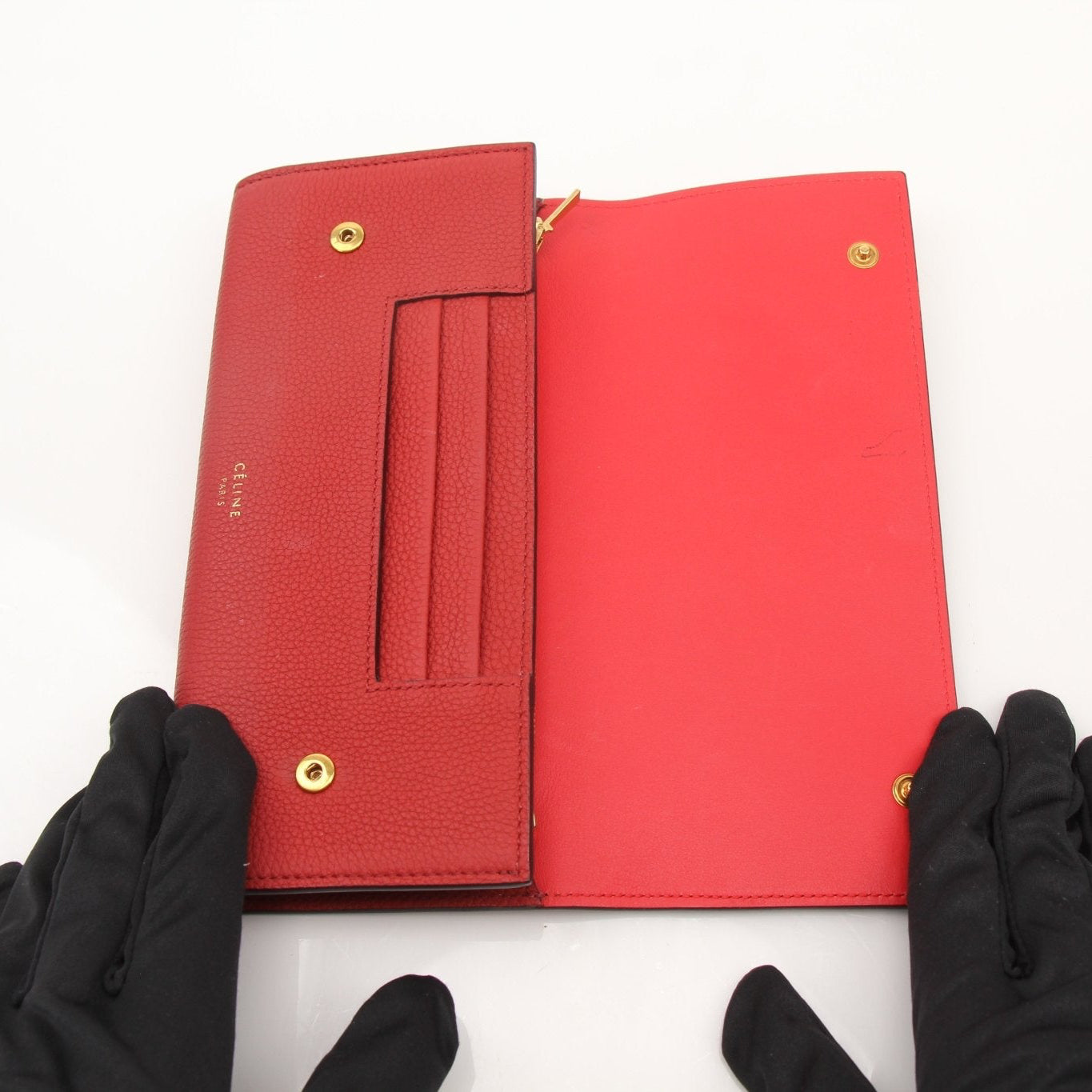 Gold & Beyond Celine Multifunction Flap Wallet with multiple card slots and sleek design, shown open with flap closed.