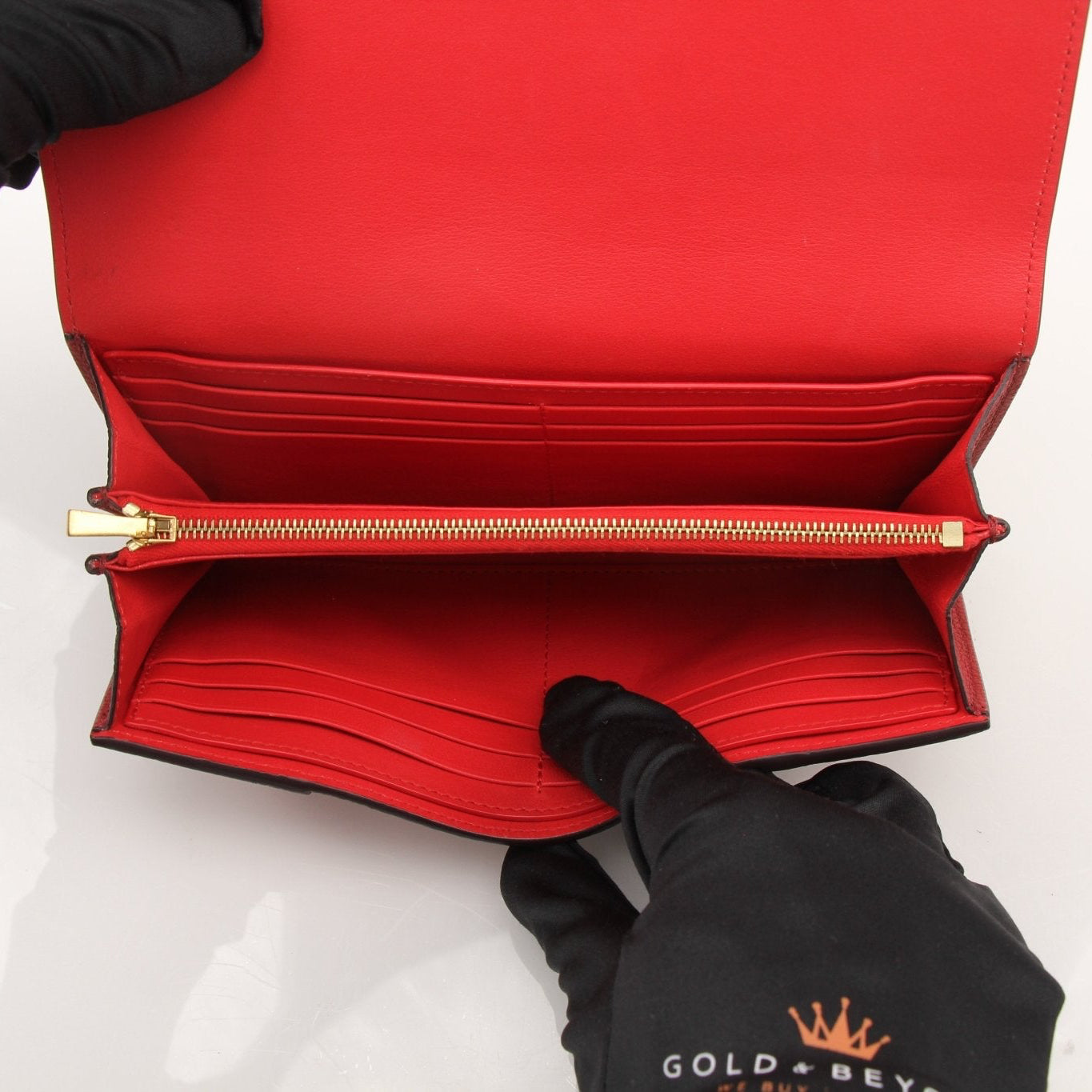 Gold & Beyond Celine Multifunction Flap Wallet with multiple card slots and compact design, displayed open showing interior details.