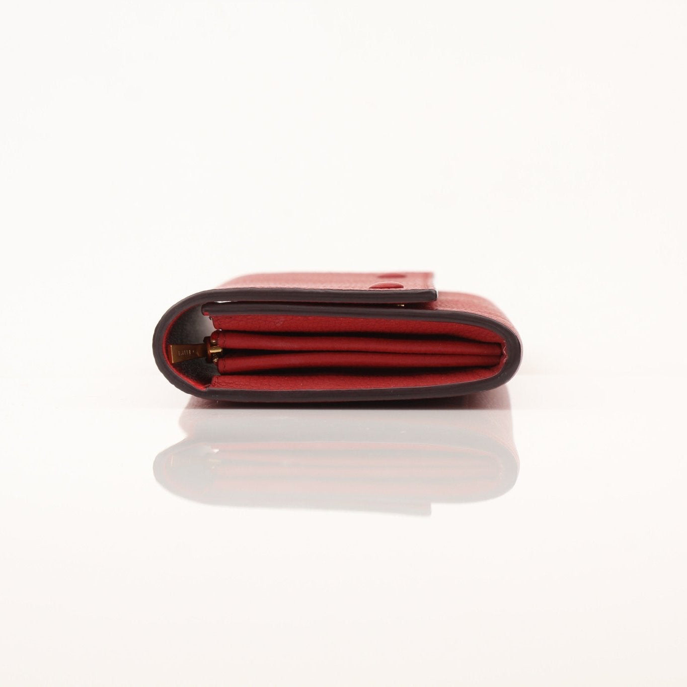 Gold & Beyond Celine Multifunction Flap Wallet with multiple card slots and sleek design, shown open with interior compartments.