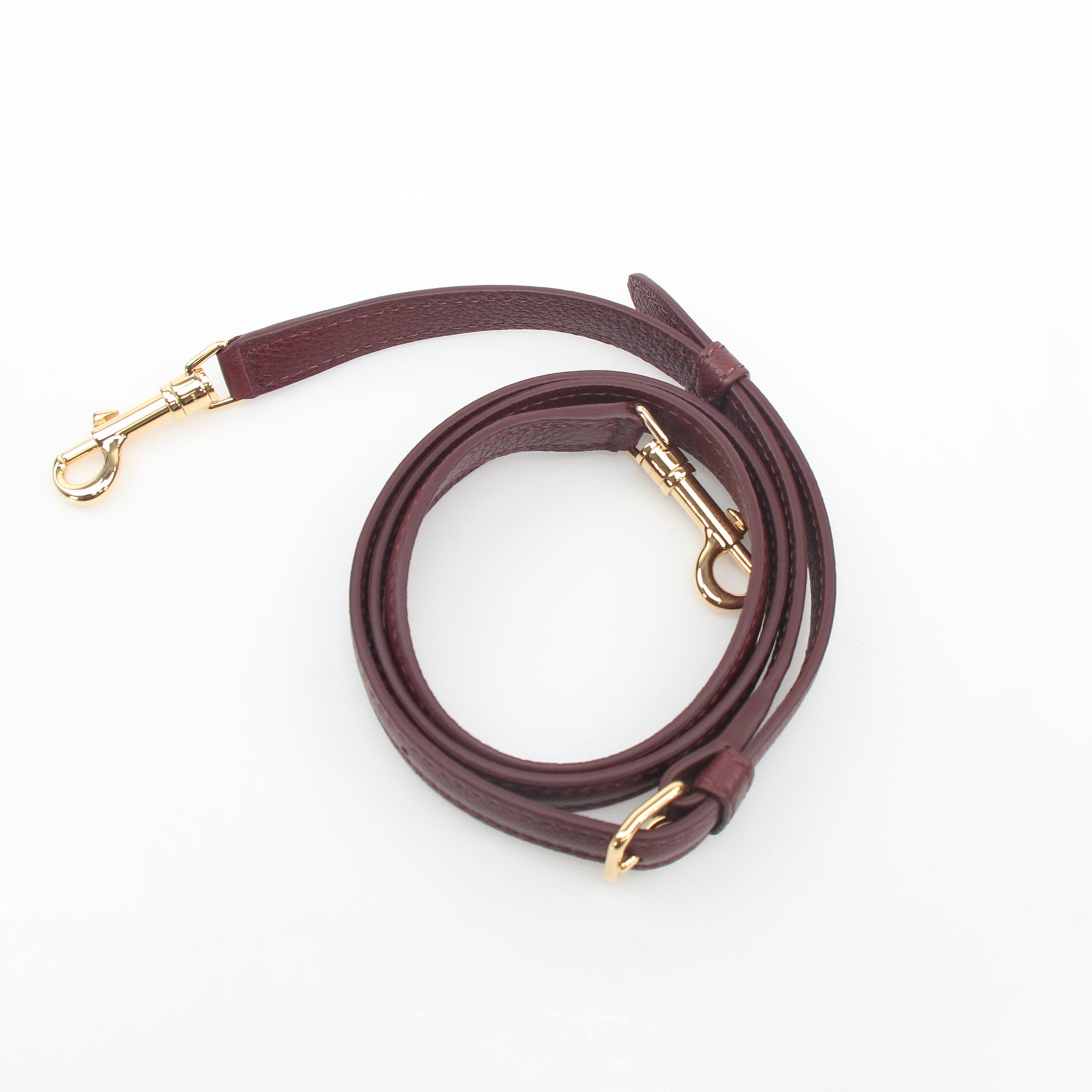 Gold & Beyond Celine Burgundy shoulder luggage tote handbag with top handles and spacious interior.