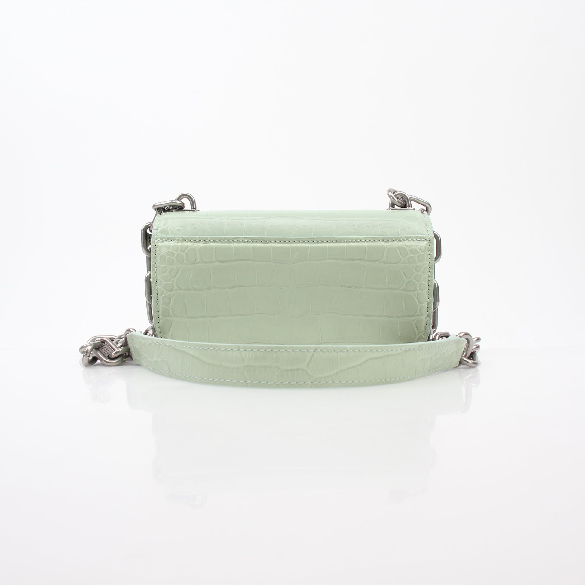 Light green Balenciaga Gossip XS chain handbag with gold hardware, featuring a structured leather design and adjustable strap.