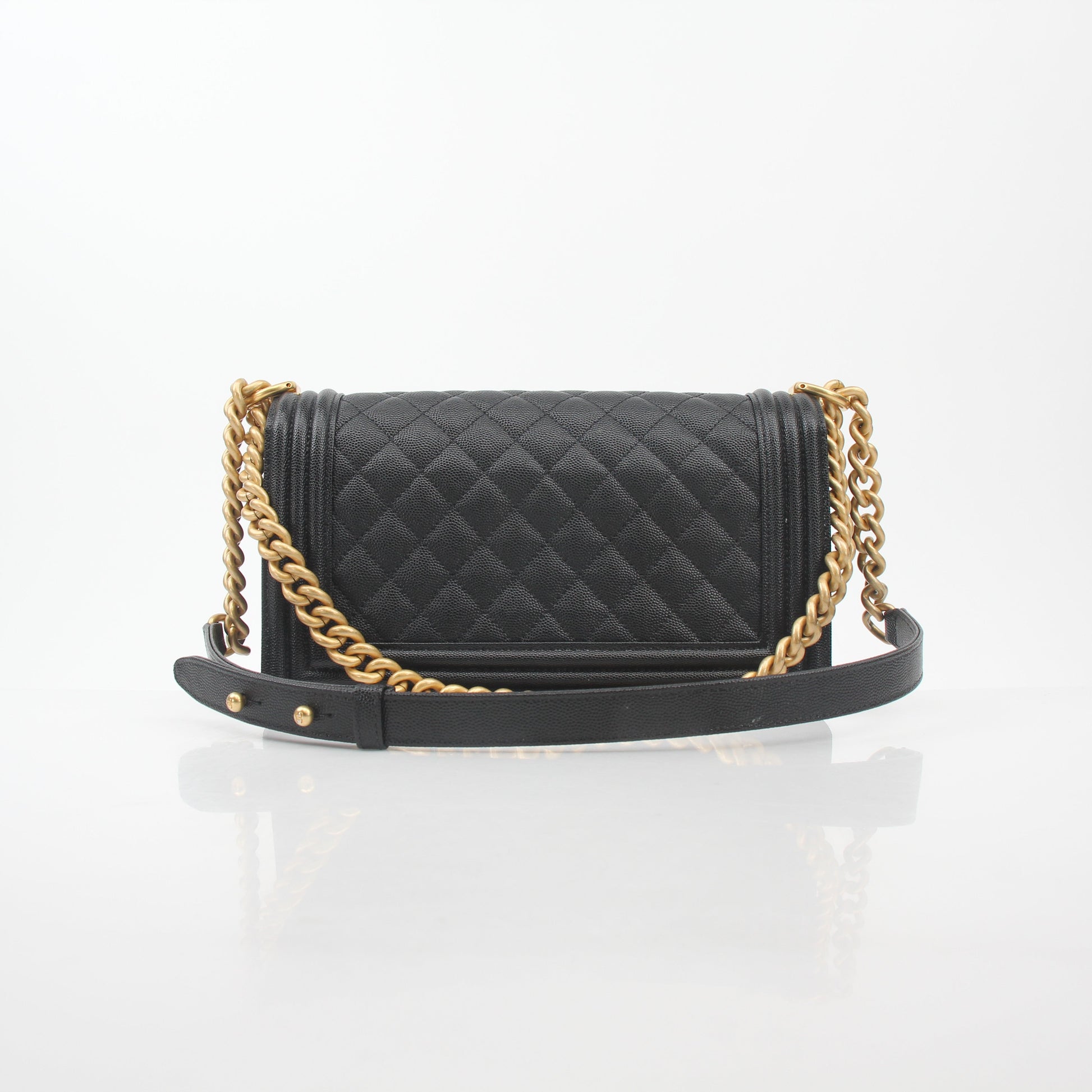 Chanel Black Caviar Boy Flap Shoulder Bag, elegant black leather handbag with gold chain strap and signature quilted design.