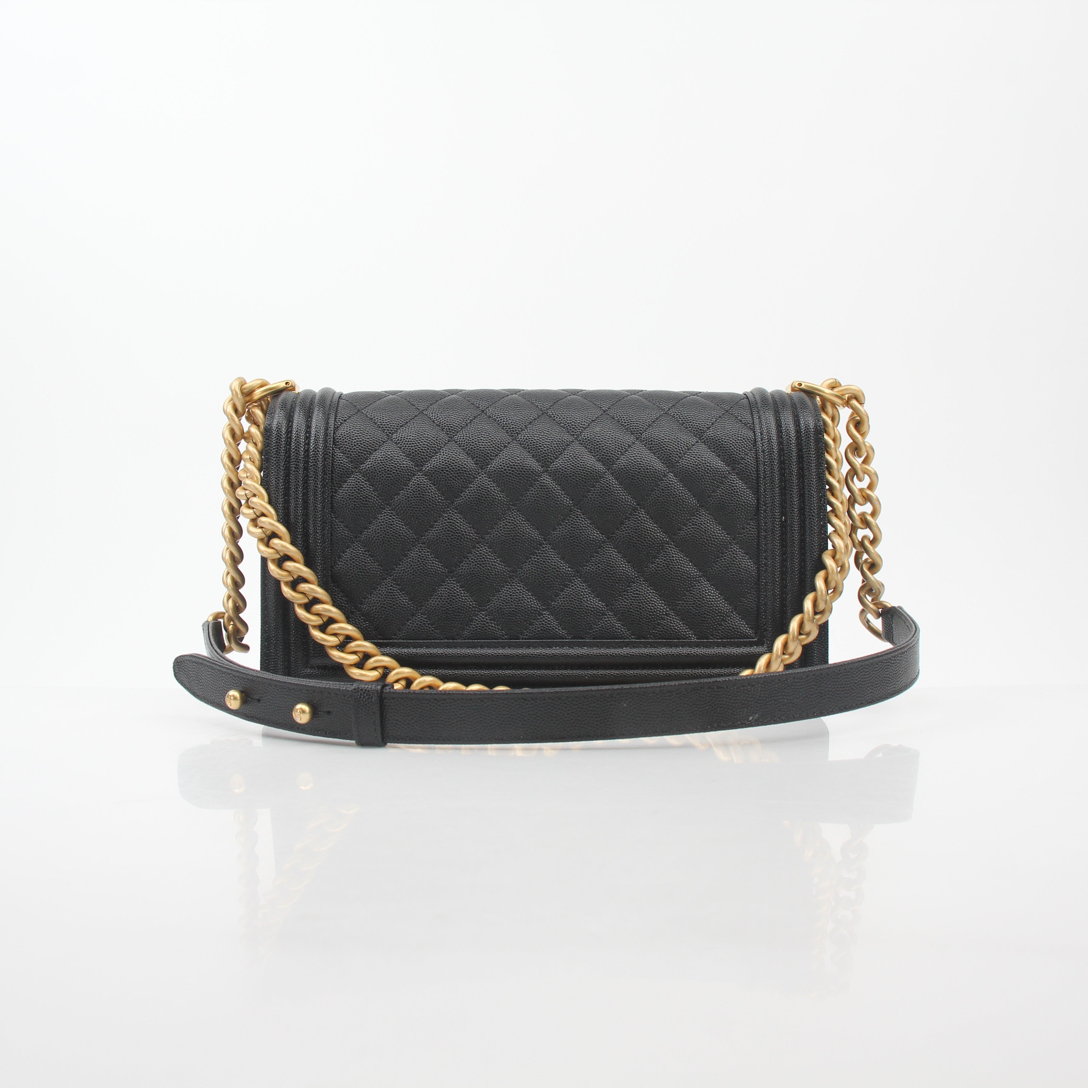 Chanel Black Caviar Boy Flap Shoulder Bag, elegant black leather handbag with gold chain strap and signature quilted design.