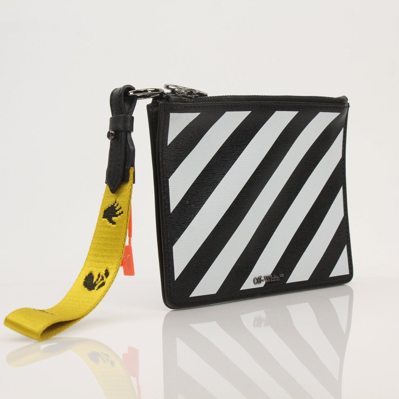 Off-White Diagonal Clutch handbag by Gold & Beyond, featuring signature diagonal pattern and sleek design.