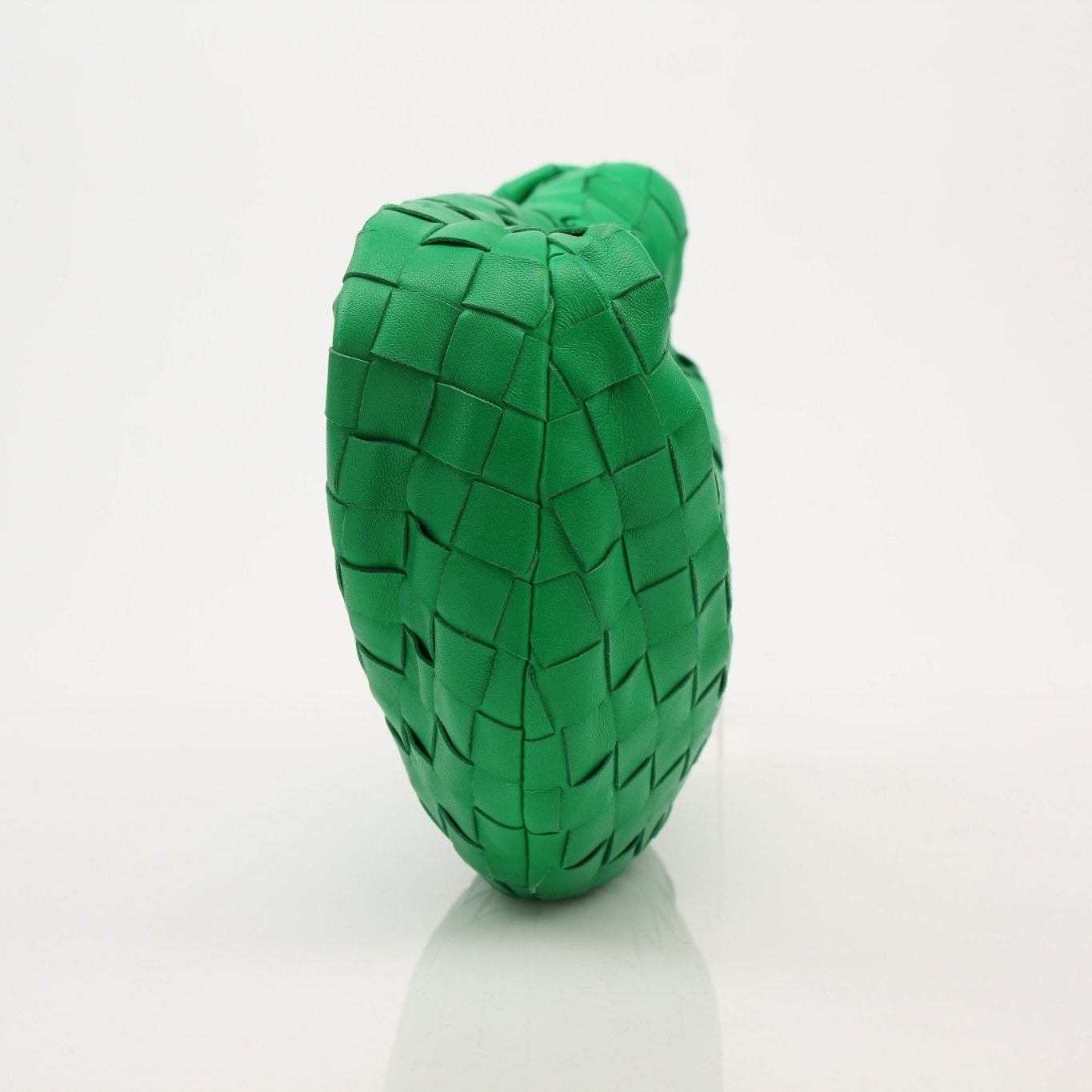 Bottega Veneta Mini Jodie Bag in soft leather with distinctive woven design and compact silhouette, perfect for stylish outings.