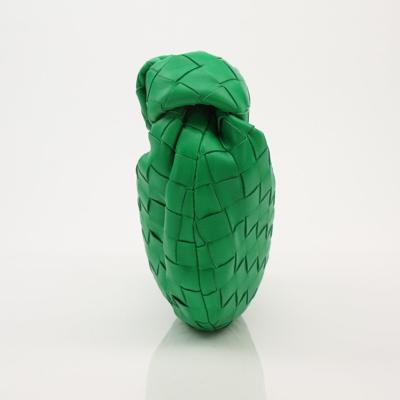 Bottega Veneta Mini Jodie Bag in soft leather, featuring a woven design and a compact silhouette, perfect for stylish outings.