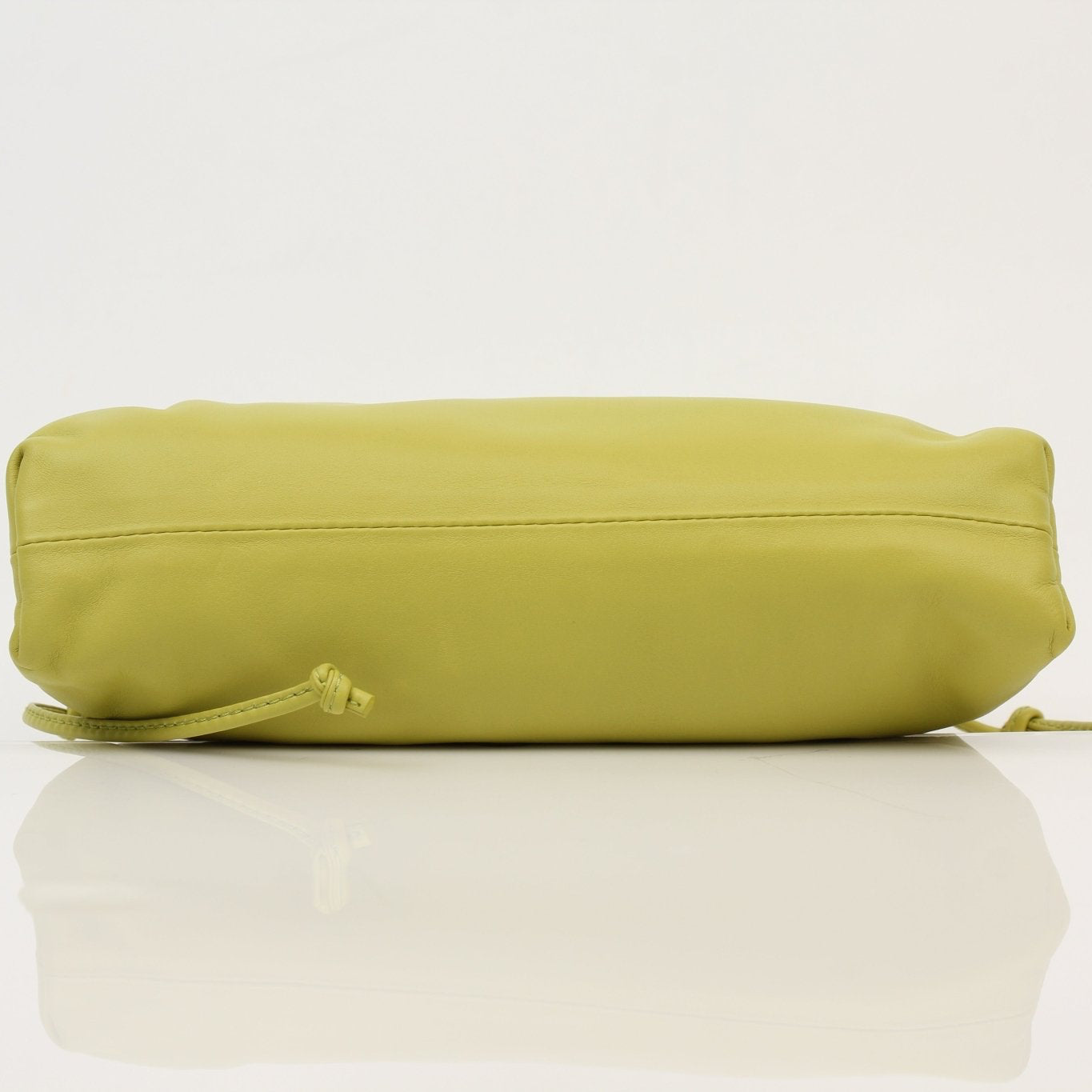 Green Bottega Veneta The Pouch Mini handbag by Gold & Beyond, featuring a sleek design and compact size.