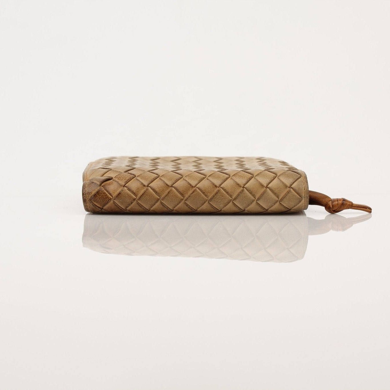 Gold & Beyond Bottega Veneta vintage Intrecciato leather wallet, showcasing woven design and compact style.