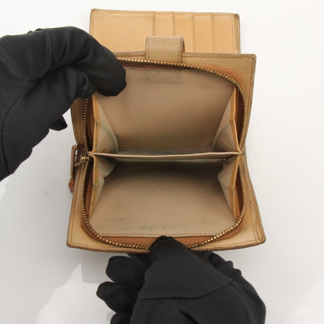 Gold & Beyond Bottega Veneta vintage Intrecciato leather wallet with woven design and multiple card slots.