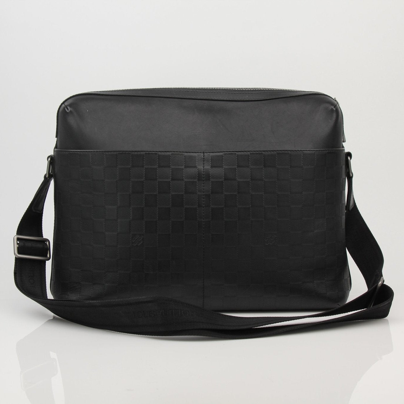 Louis Vuitton Messenger MM Calypso travel bag with leather accents and adjustable strap, stylish and functional for travel.