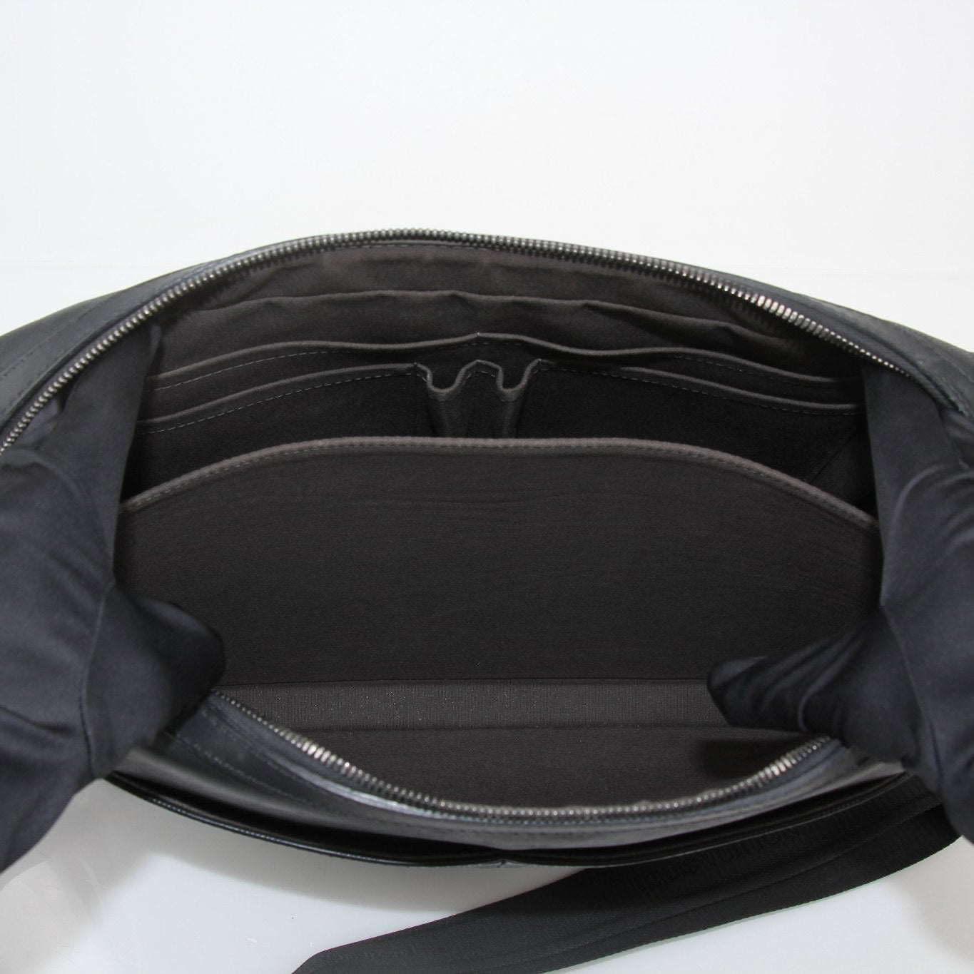 Gold & Beyond Louis Vuitton Messenger MM Calypso travel bag with adjustable strap and signature monogram canvas.