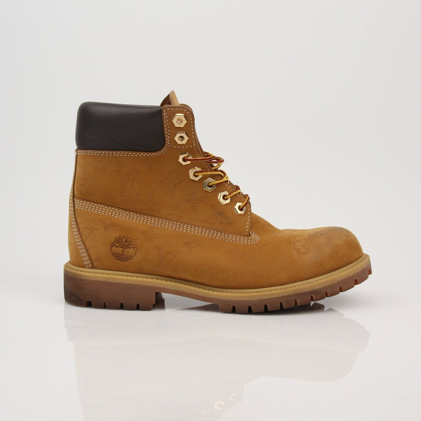 Louis Vuitton x Timberland Monogram Nubuck Boots, size 9, featuring brown nubuck leather and monogram details, displayed on a neutral background.