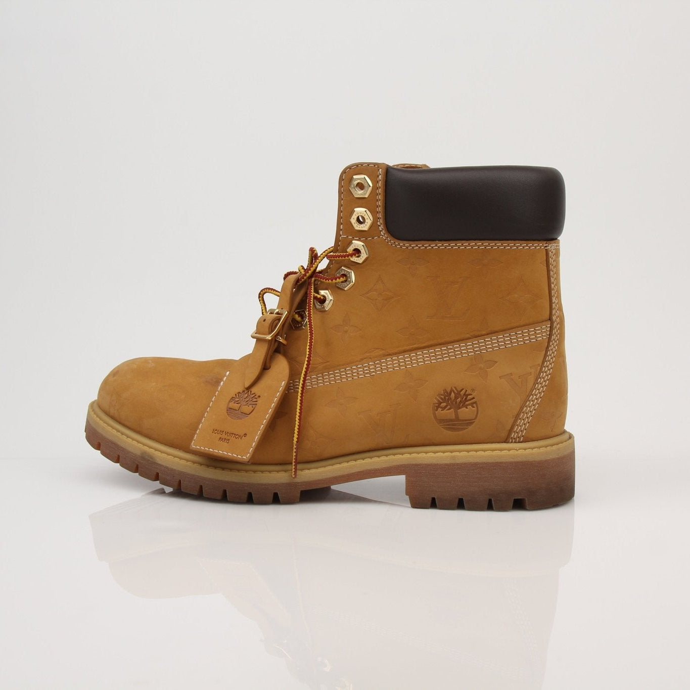 Louis Vuitton x Timberland Monogram Nubuck Boots, size 9, stylish brown shoes with LV and Timberland branding, close-up view