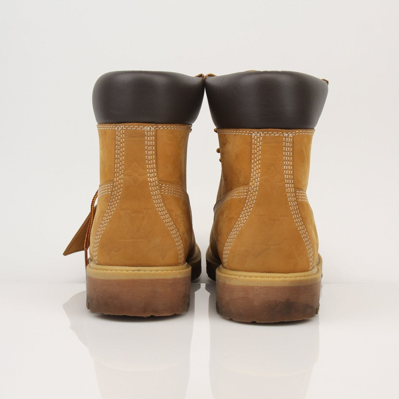 Louis Vuitton x Timberland Monogram Nubuck Boots in size 9, stylish shoes with monogram details and rugged design.