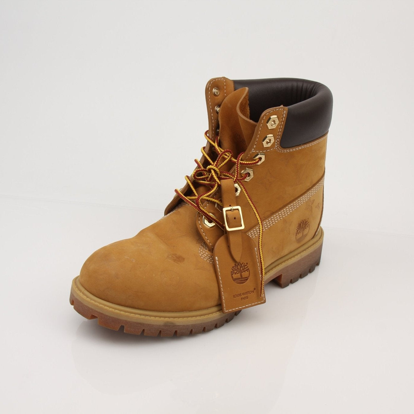 Louis Vuitton x Timberland Monogram Nubuck Boots in size 9, stylish shoes with monogram design and rugged sole.