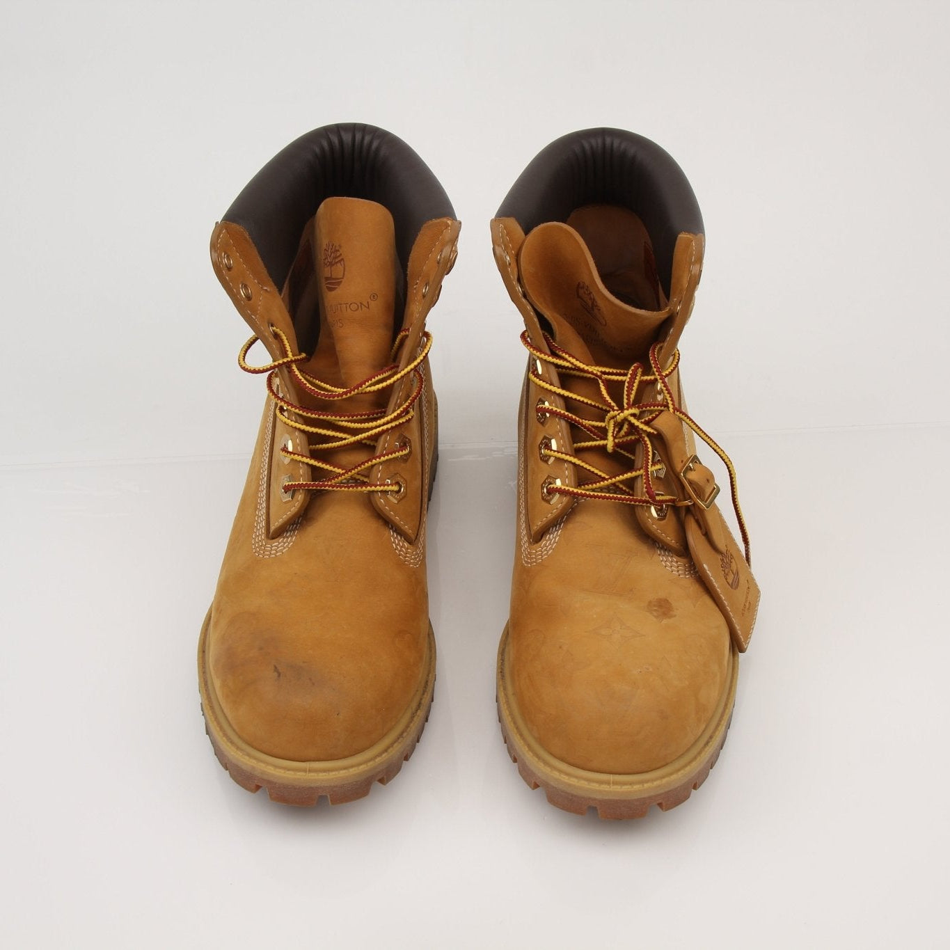 Louis Vuitton x Timberland Monogram Nubuck Boots in size 9, featuring brown nubuck leather and monogram details.