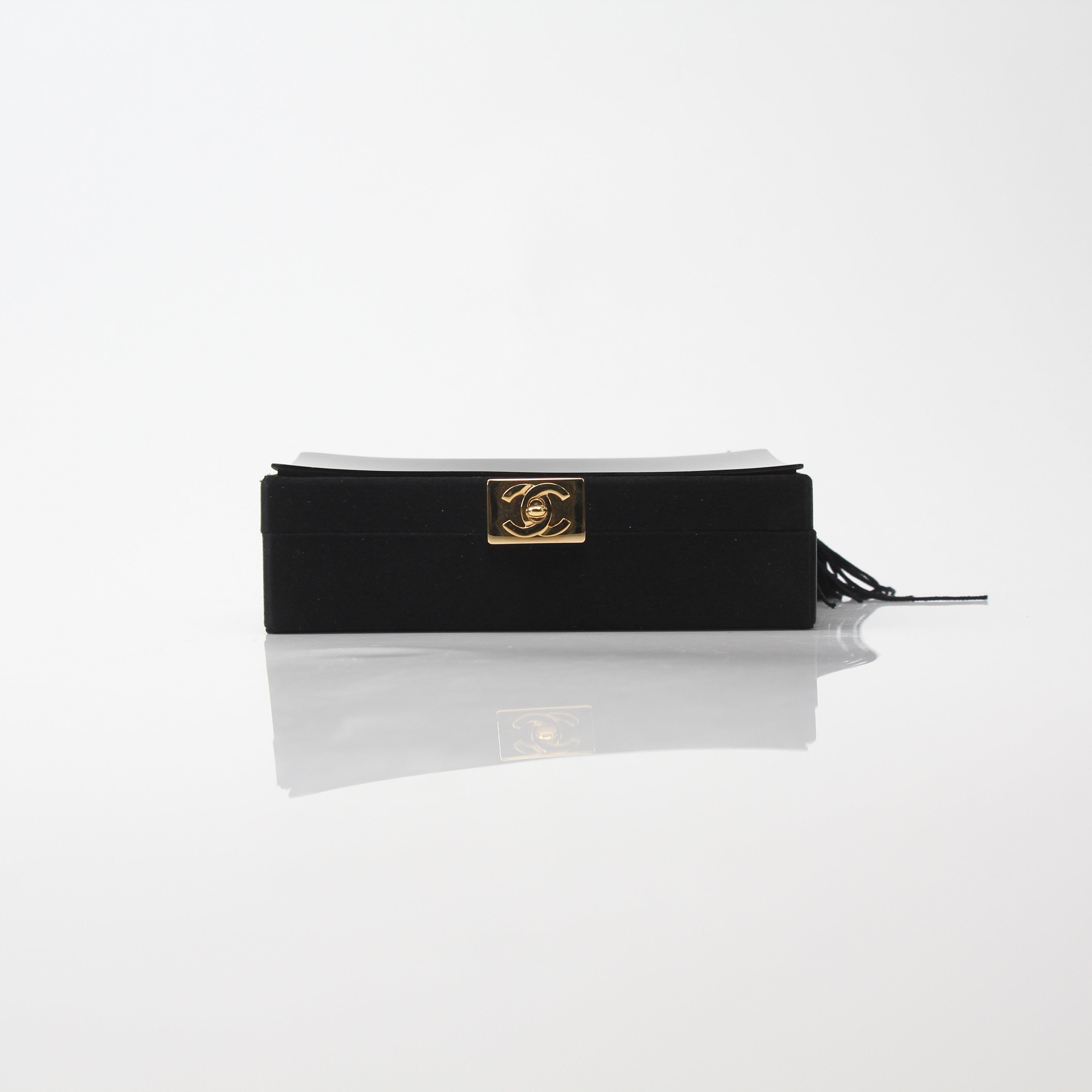 Chanel Interlocking CC Clutch Bag with Tassel Detail
