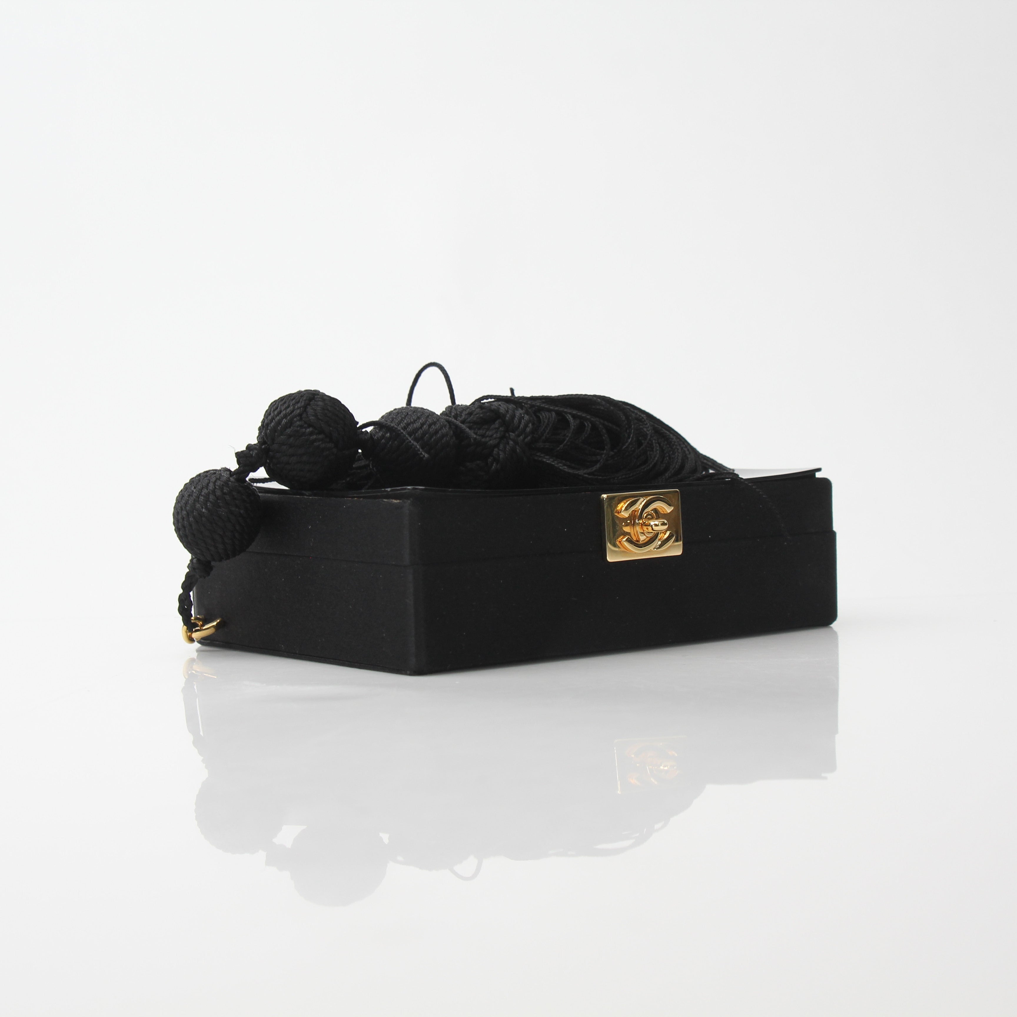 Chanel Interlocking CC Clutch Bag with Tassel Detail
