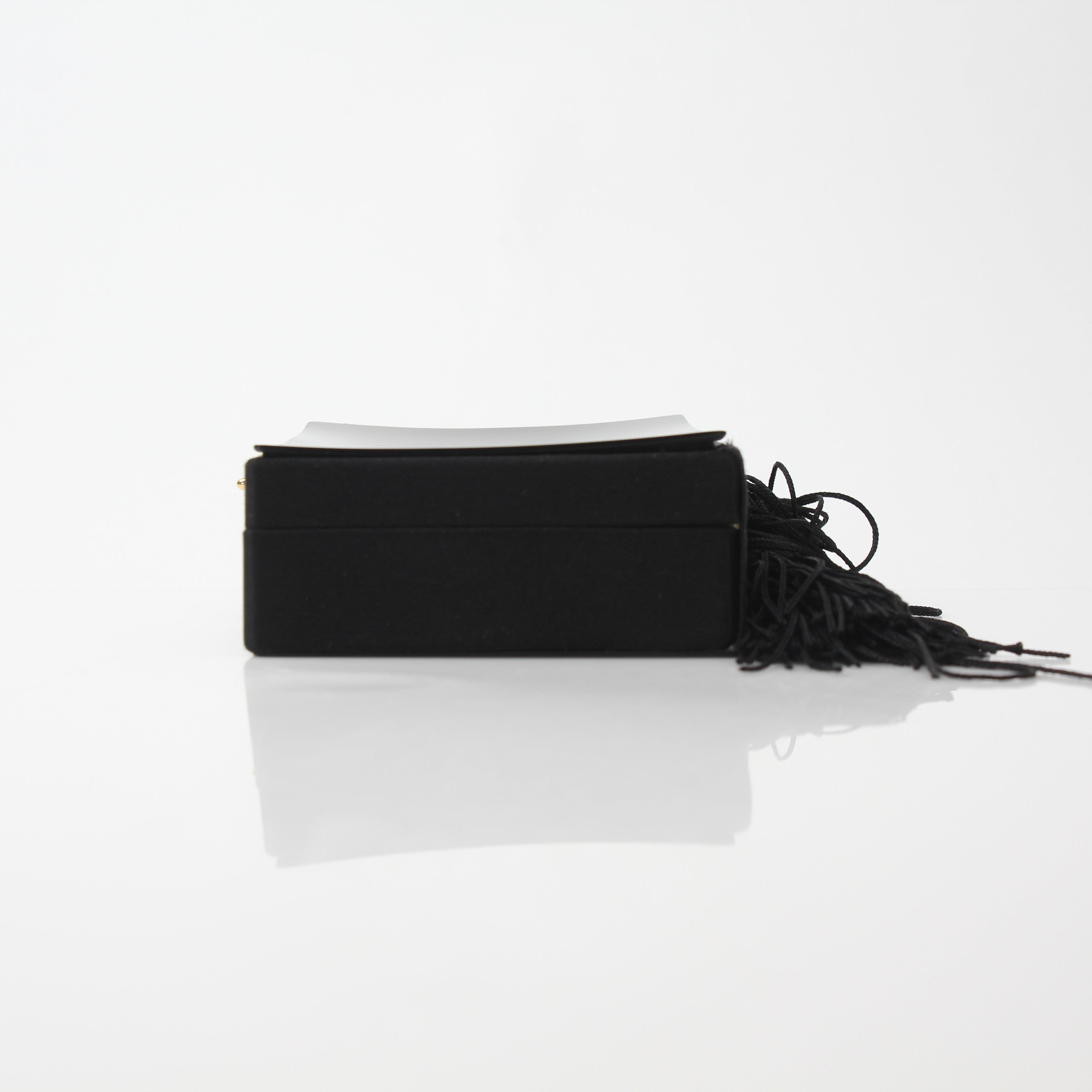 Chanel Interlocking CC Clutch Bag with Tassel Detail