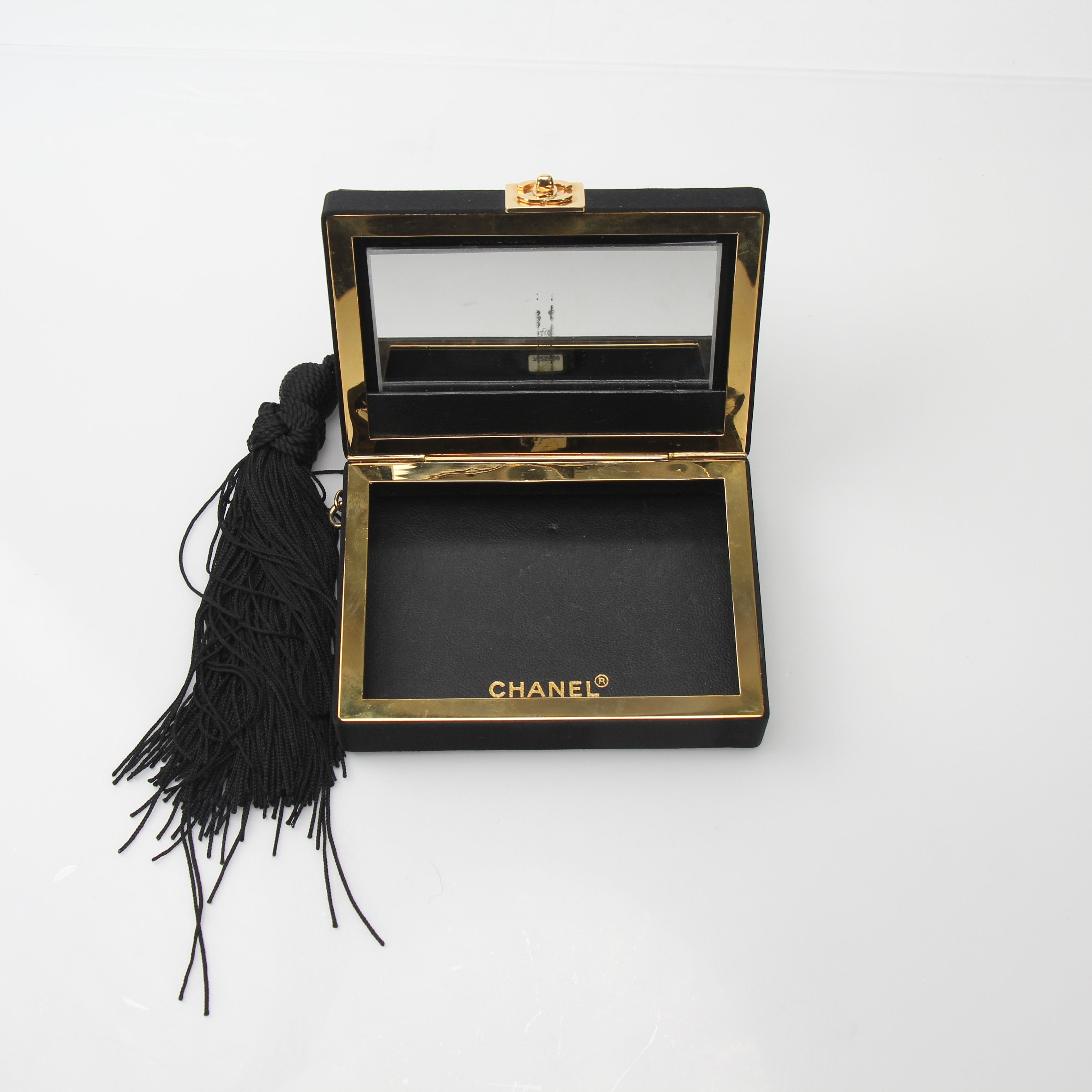 Chanel Interlocking CC Clutch Bag with Tassel Detail