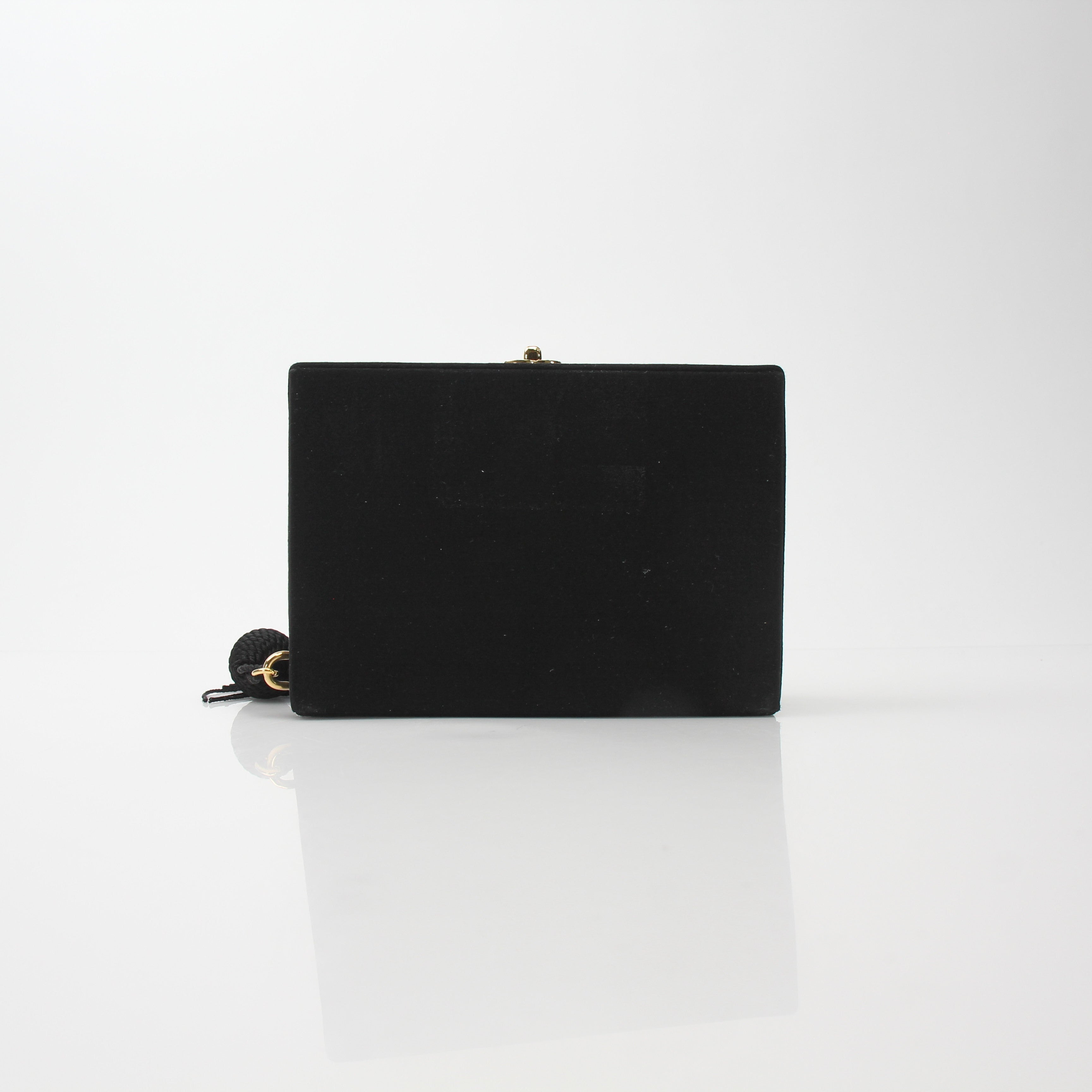 Chanel Interlocking CC Clutch Bag with Tassel Detail