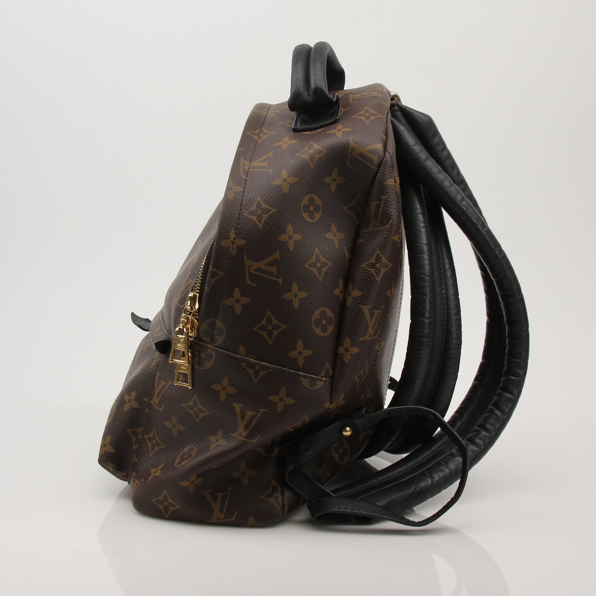Louis Vuitton Palm Springs MM backpack from Gold & Beyond, stylish travel bag with signature monogram canvas and leather accents.