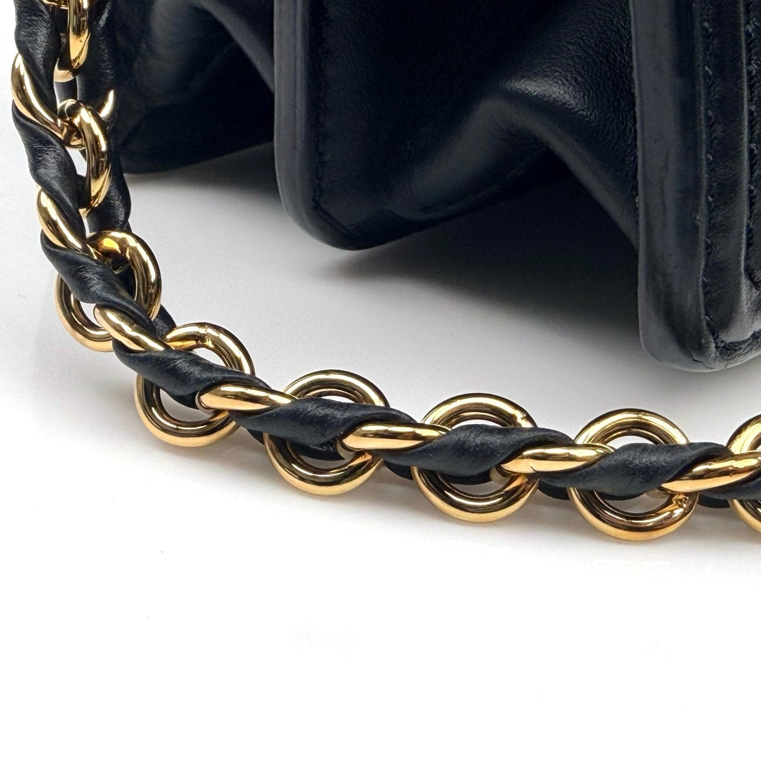 Gold & Beyond Louis Vuitton Mini Dauphine crossbody handbag with gold hardware and monogram canvas, featuring a compact, stylish design.