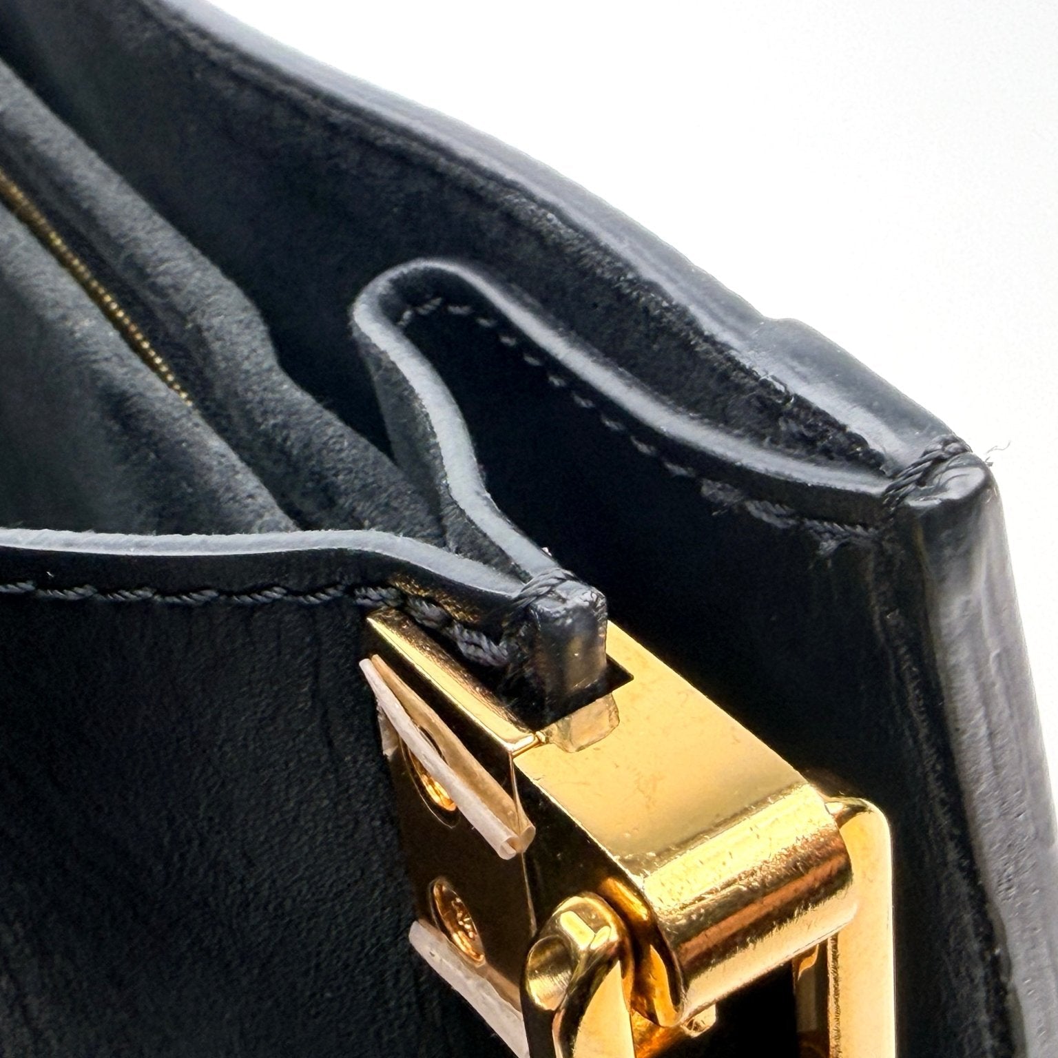 Louis Vuitton Mini Dauphine crossbody handbag in leather with gold-tone hardware, compact and stylish for everyday use.