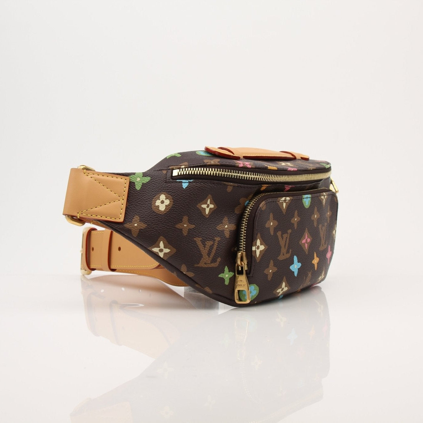 Louis Vuitton x Tyler The Creator handbag, gold and blue bum bag with logo details, stylish accessory for casual wear.