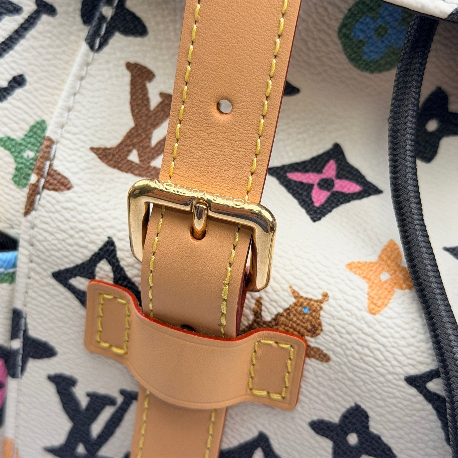 Louis Vuitton Christopher backpack in black leather, stylish travel bag with gold hardware, by Gold & Beyond.