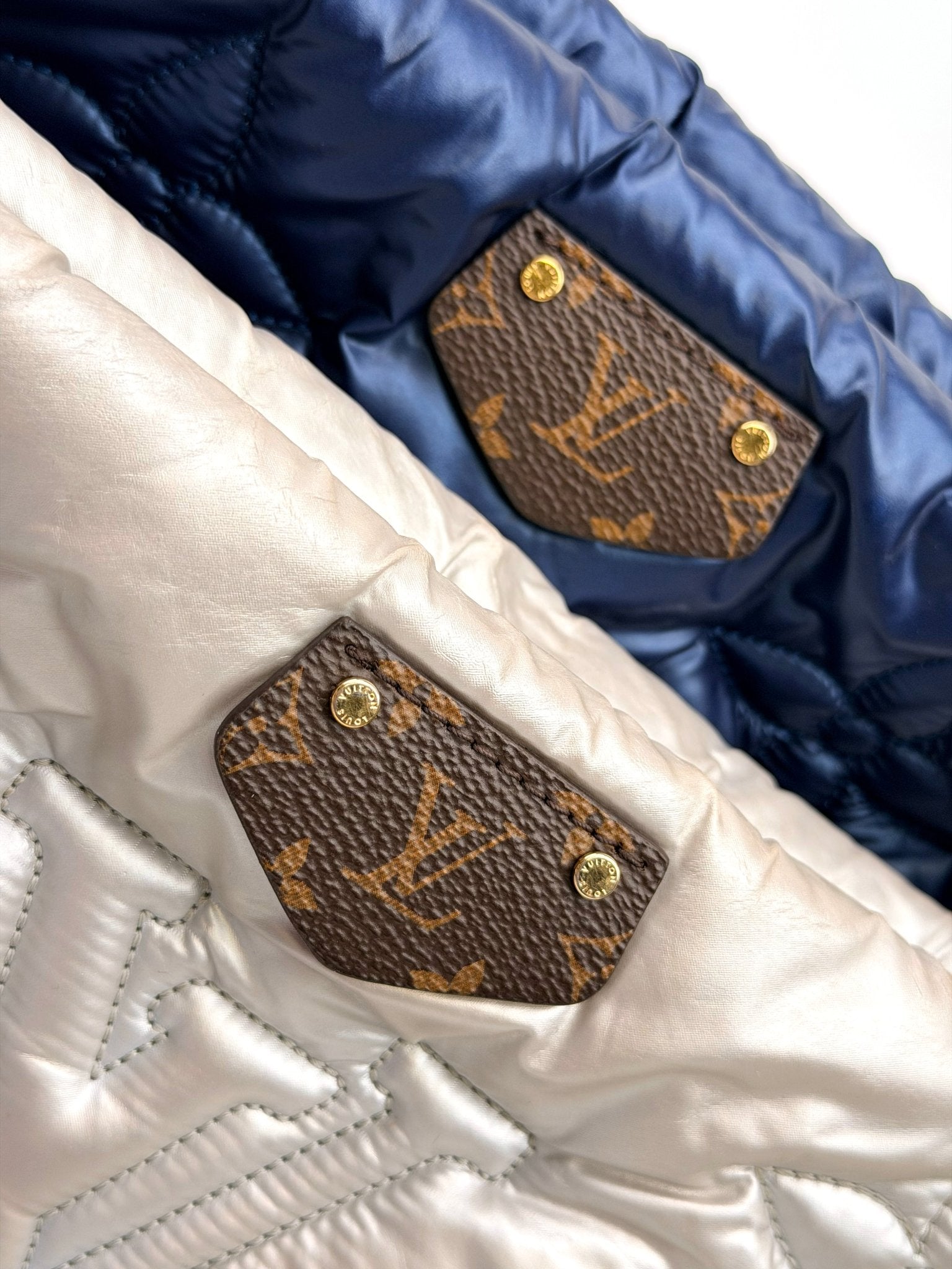 Louis Vuitton Pillow Multi Pochette handbag by Gold & Beyond, featuring a stylish, padded design with multiple compartments and gold accents.