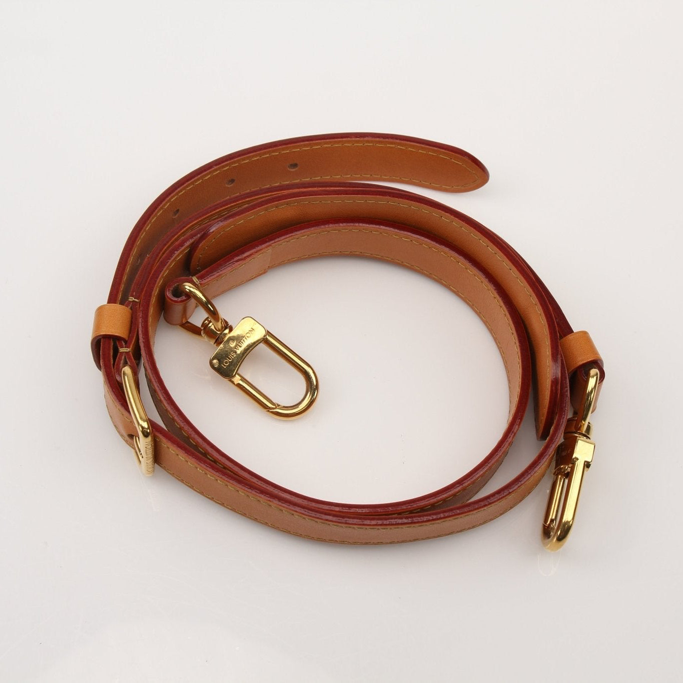 Louis Vuitton Keepall 25 Monogram Canvas handbag with leather trim, zipper closure, and gold-tone hardware.