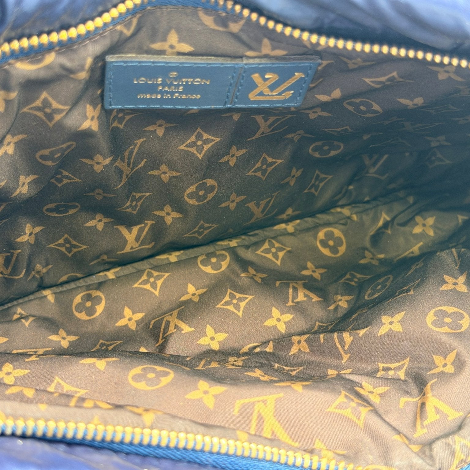 Louis Vuitton Pillow Multi Pochette handbag by Gold & Beyond, featuring colorful fabric and multiple compartments.