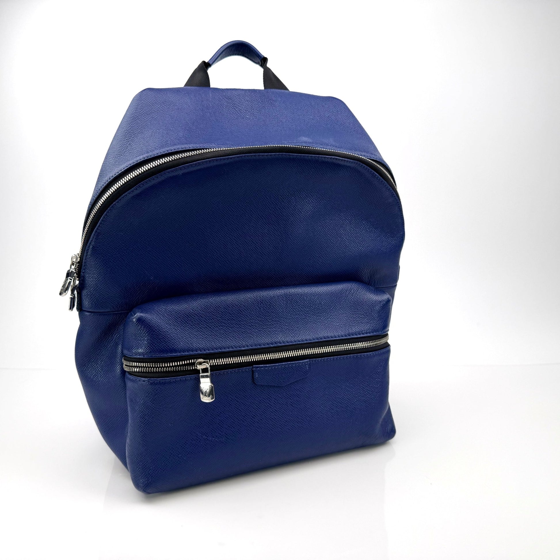 Louis Vuitton Discovery Backpack in travel bag style with monogram canvas and leather accents, designed for stylish travel and everyday use.