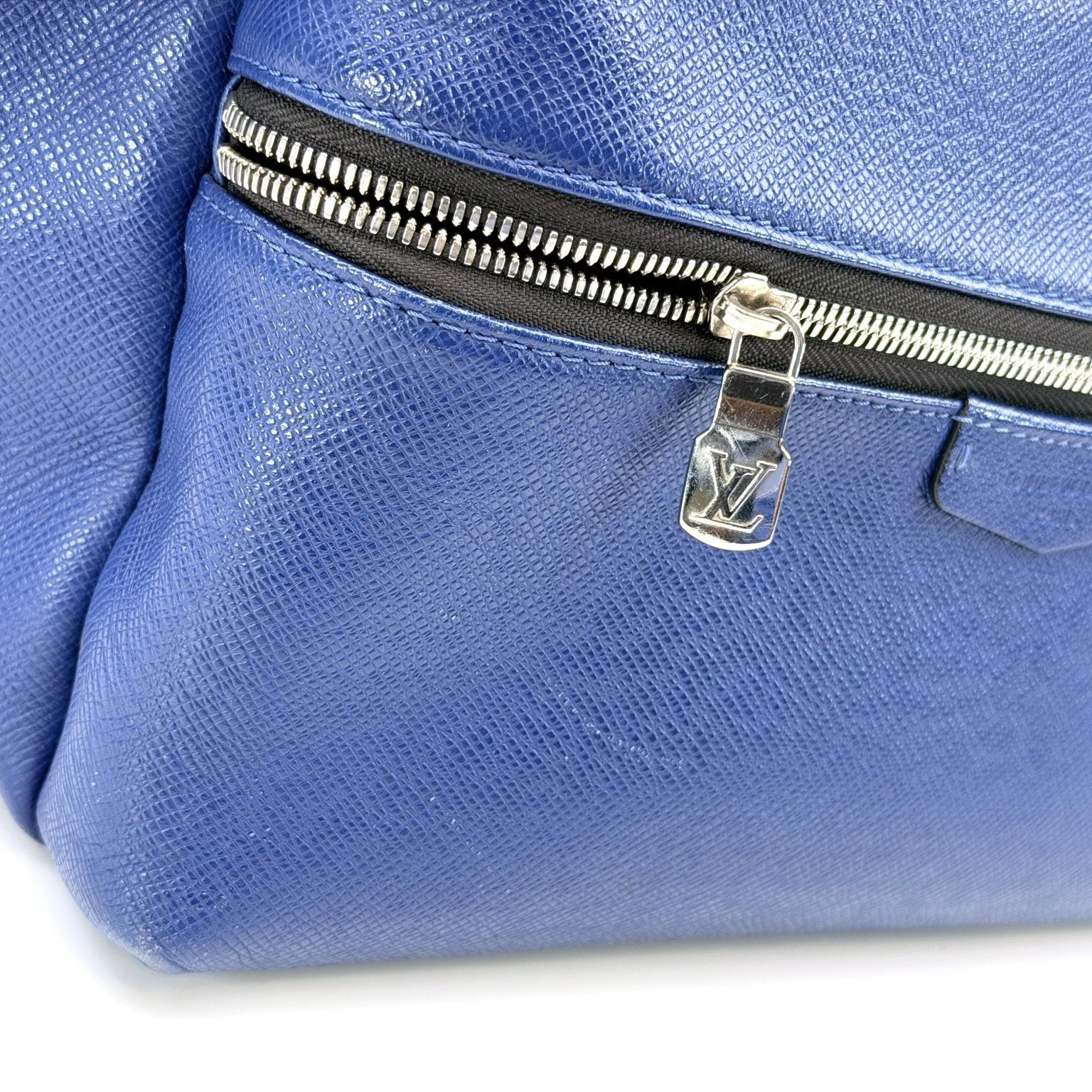 Louis Vuitton Discovery Backpack in travel bag style by Gold & Beyond, featuring durable fabric and adjustable straps.