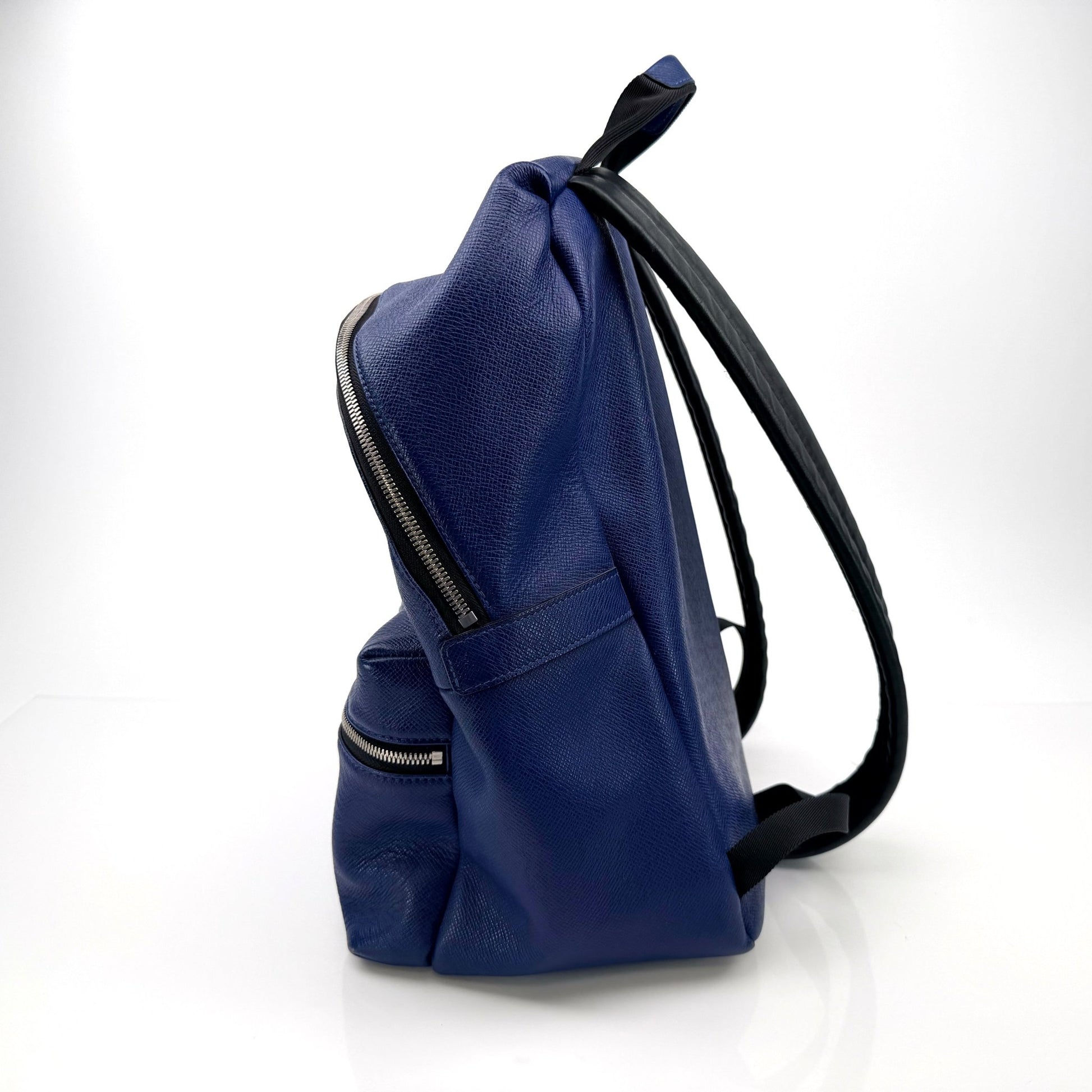 Gold & Beyond Louis Vuitton Discovery Backpack for travel, featuring sleek design and spacious compartments.