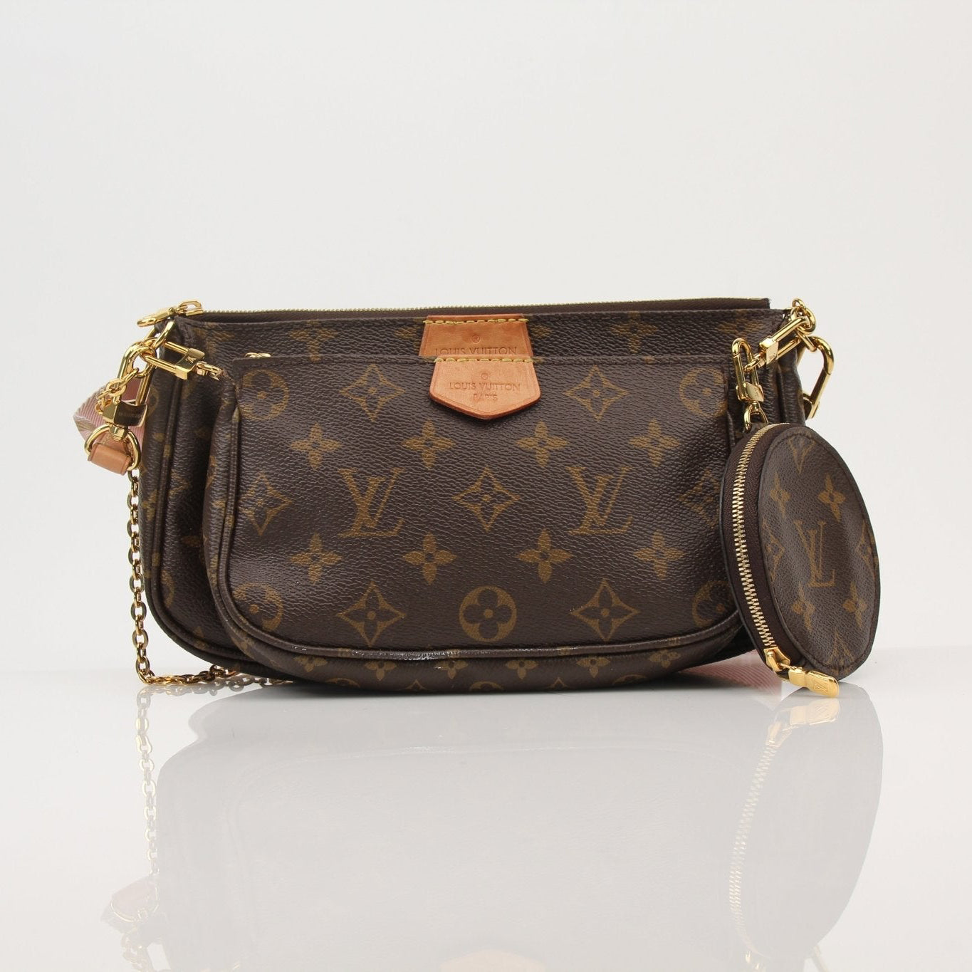 Louis Vuitton Multi Pochette handbag by Gold & Beyond featuring a stylish multi-compartment design and elegant gold-tone hardware.