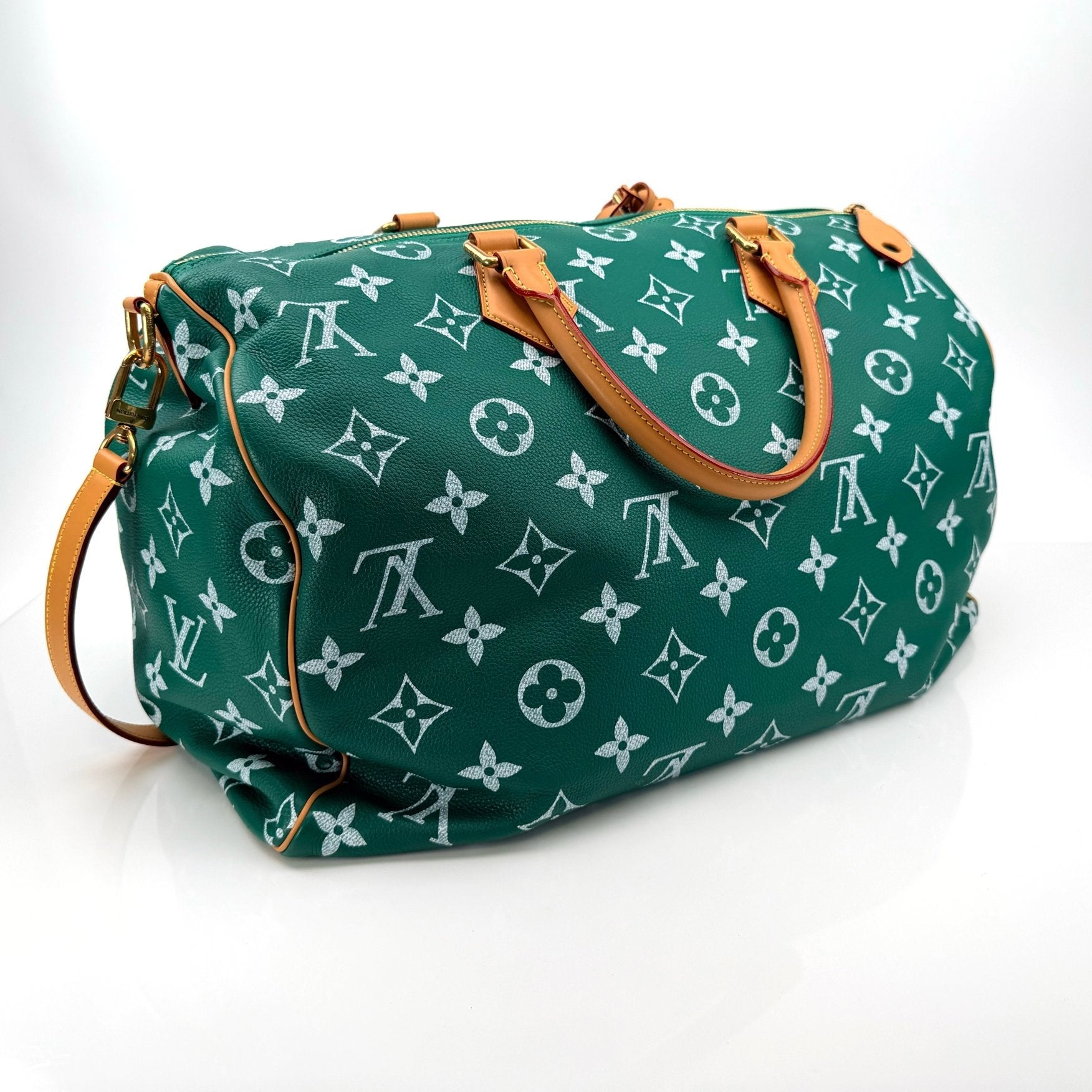Louis Vuitton Speedy 950 travel bag by Gold & Beyond, featuring beige monogram canvas, leather trim, and gold-tone hardware.