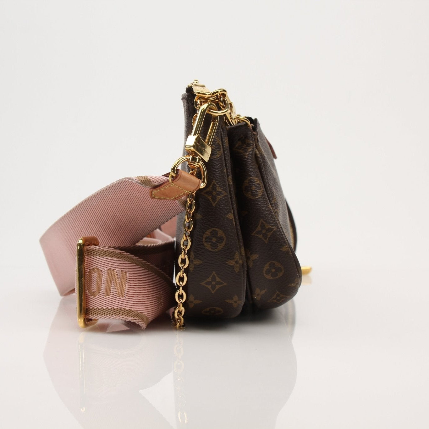 Louis Vuitton Multi Pochette handbag by Gold & Beyond, featuring multiple compartments and stylish design, shown in the image.