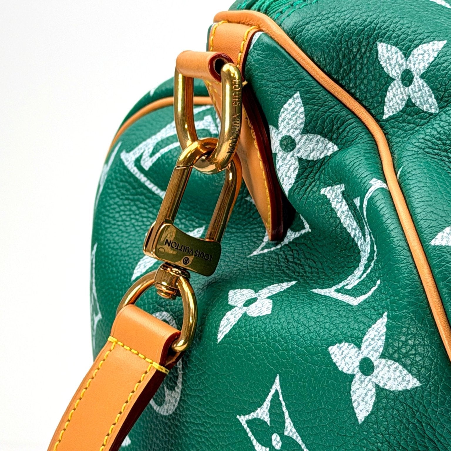 Gold & Beyond Louis Vuitton Speedy 950 travel bag in classic monogram canvas with leather trim and gold-tone hardware.