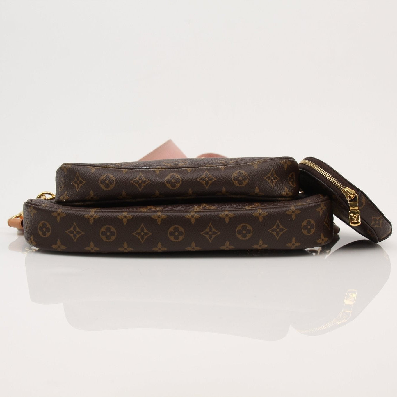 Louis Vuitton Multi Pochette handbag by Gold & Beyond, featuring layered leather straps and signature monogram canvas detail.
