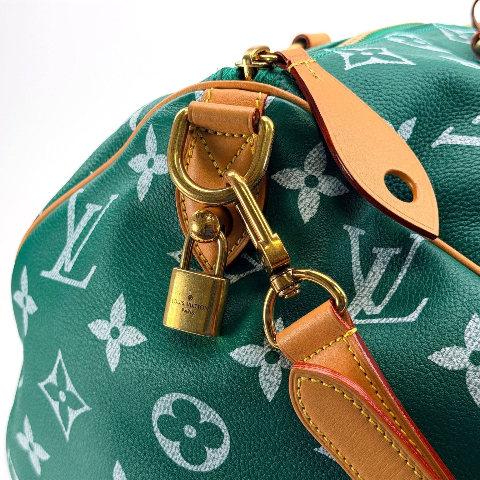 Louis Vuitton Speedy 950 travel bag by Gold & Beyond, featuring classic monogram canvas and leather handles.