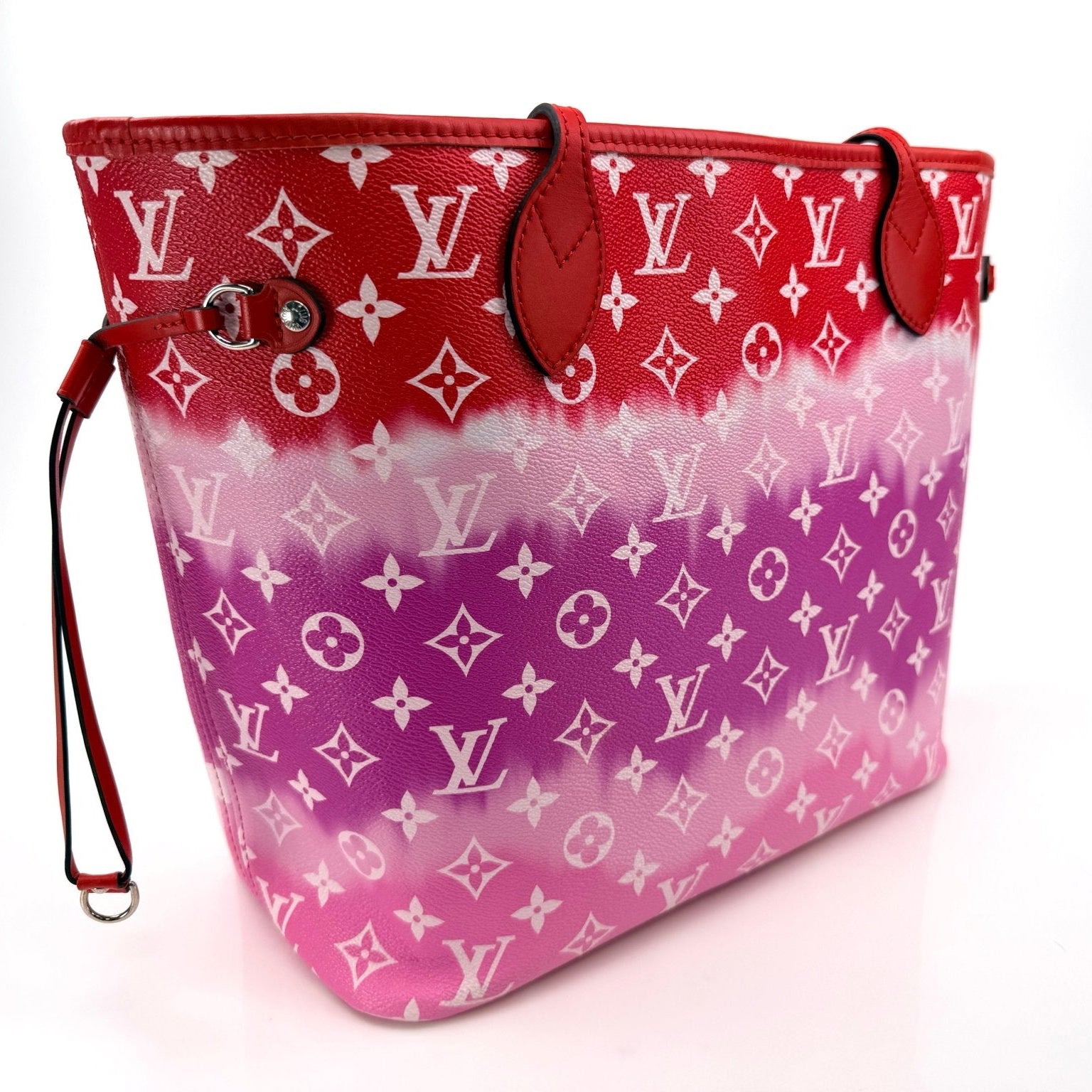 Louis Vuitton Neverfull Escale tote handbag by Gold & Beyond, featuring canvas material and leather trim, displayed on a neutral background.