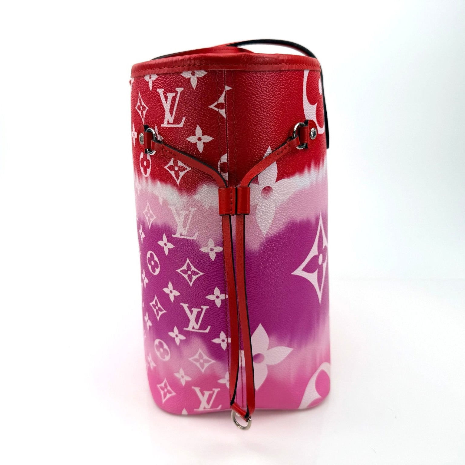 Louis Vuitton Neverfull Escale tote handbag in vibrant pattern, featuring leather handles and spacious interior.